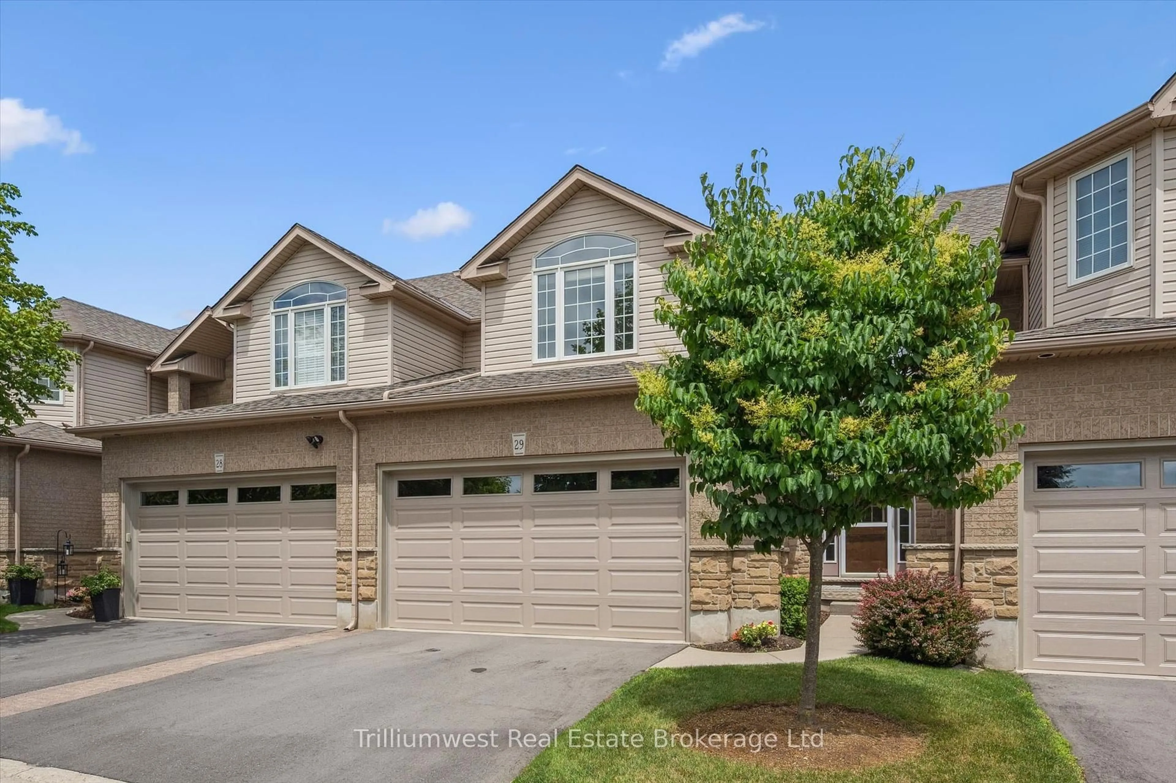 Home with vinyl exterior material, street for 254 Summerfield Dr #29, Guelph Ontario N1L 1R4