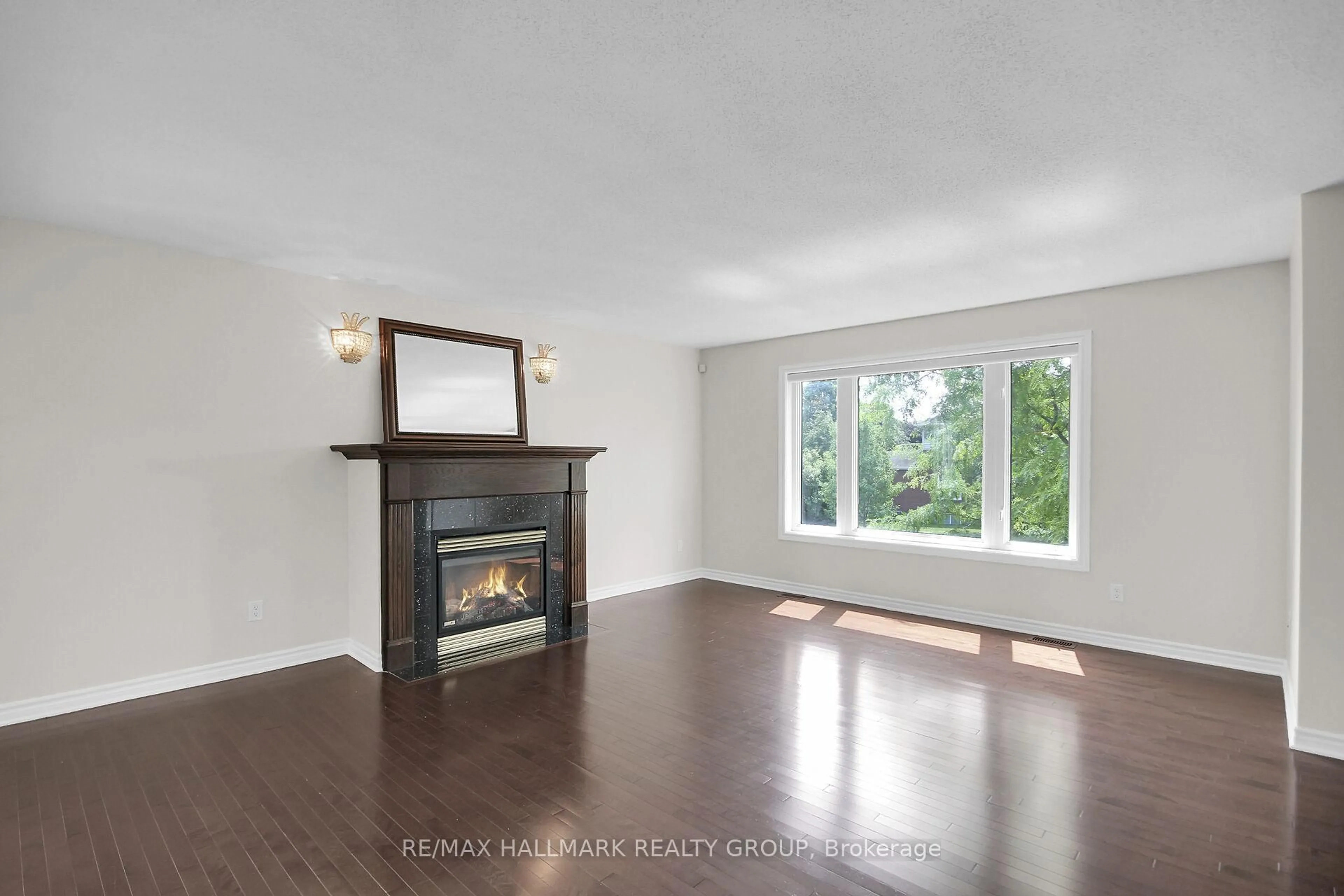 Living room with furniture, wood/laminate floor for 20 Edenvale Dr #5, Ottawa Ontario K2K 3L4