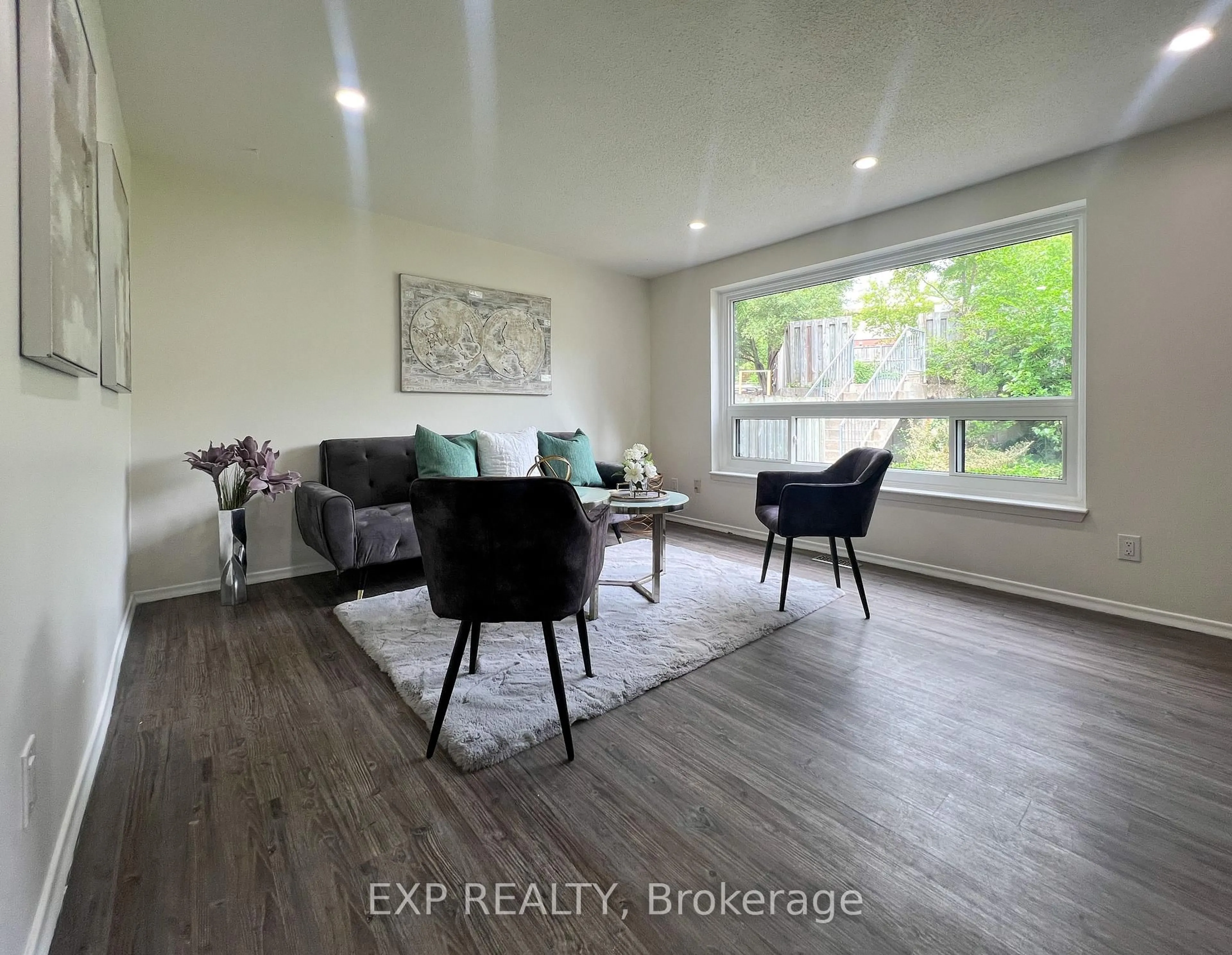 Living room with furniture, wood/laminate floor for 280 Thaler Ave #9, Kitchener Ontario N2A 1R6
