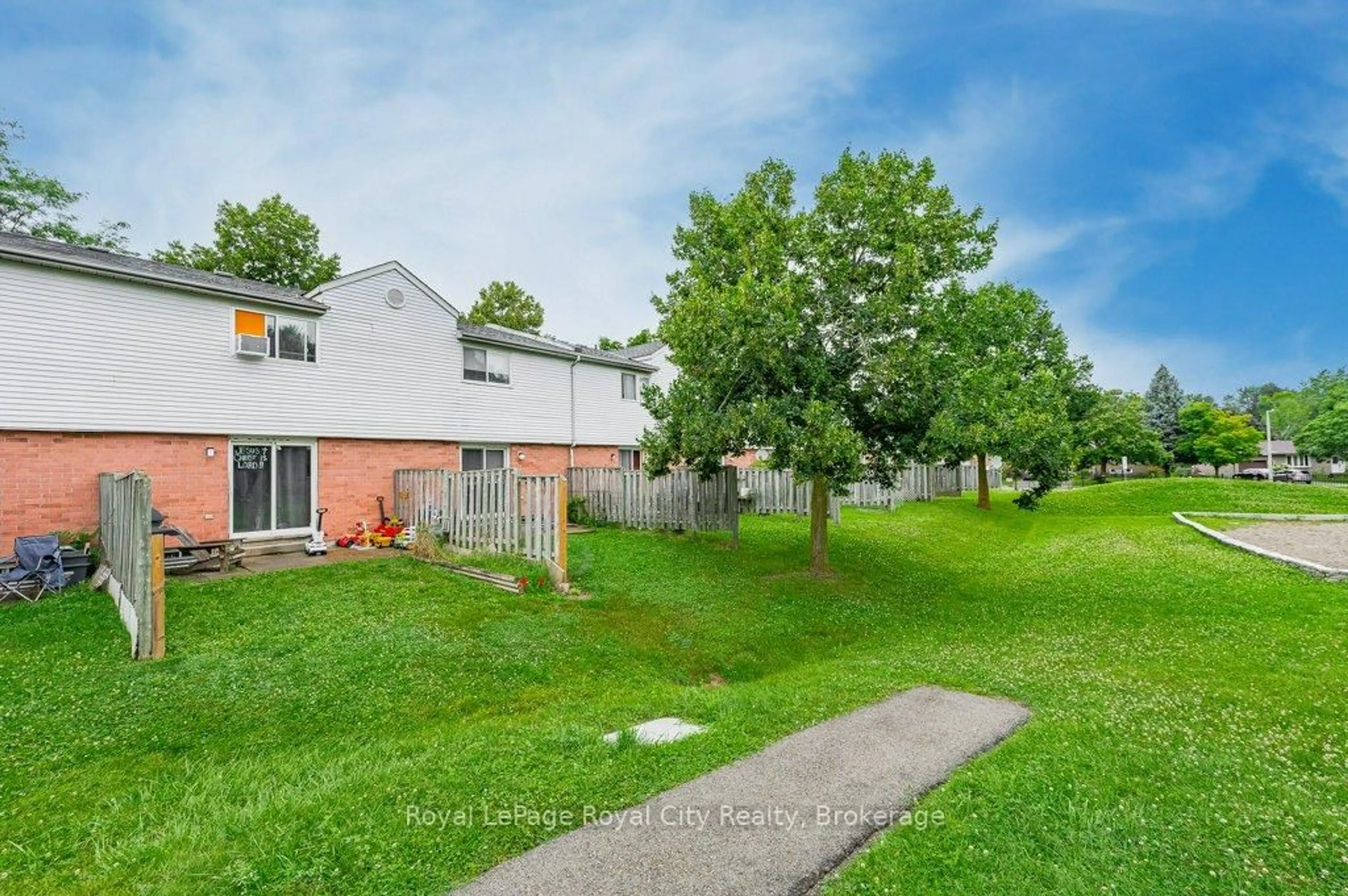 A pic from outside/outdoor area/front of a property/back of a property/a pic from drone, street for 40 Imperial Rd #8, Guelph Ontario N1H 8B4