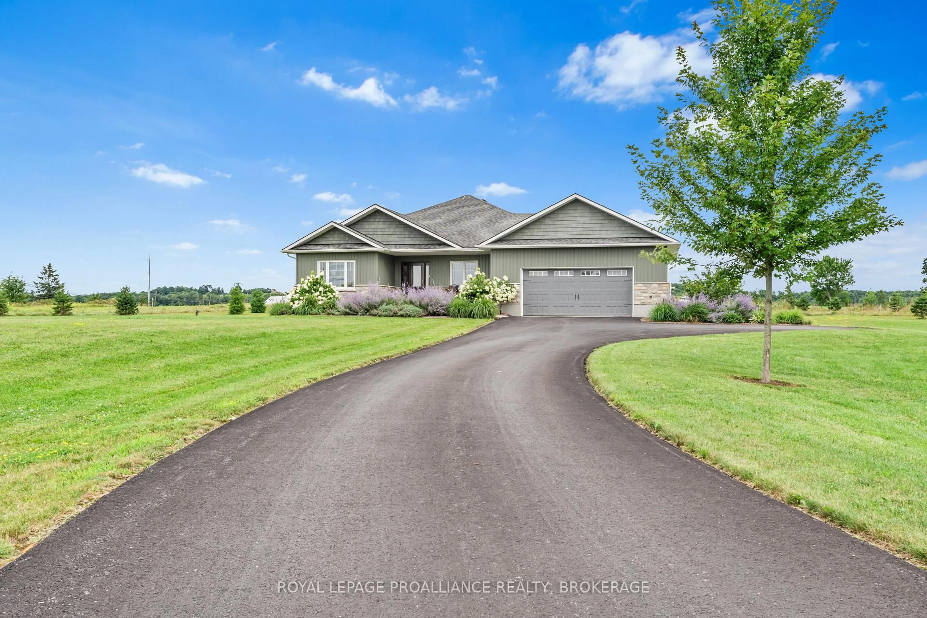 A pic from outside/outdoor area/front of a property/back of a property/a pic from drone, street for 5 Sandstone Crt, Inverary Ontario K0H 1X0