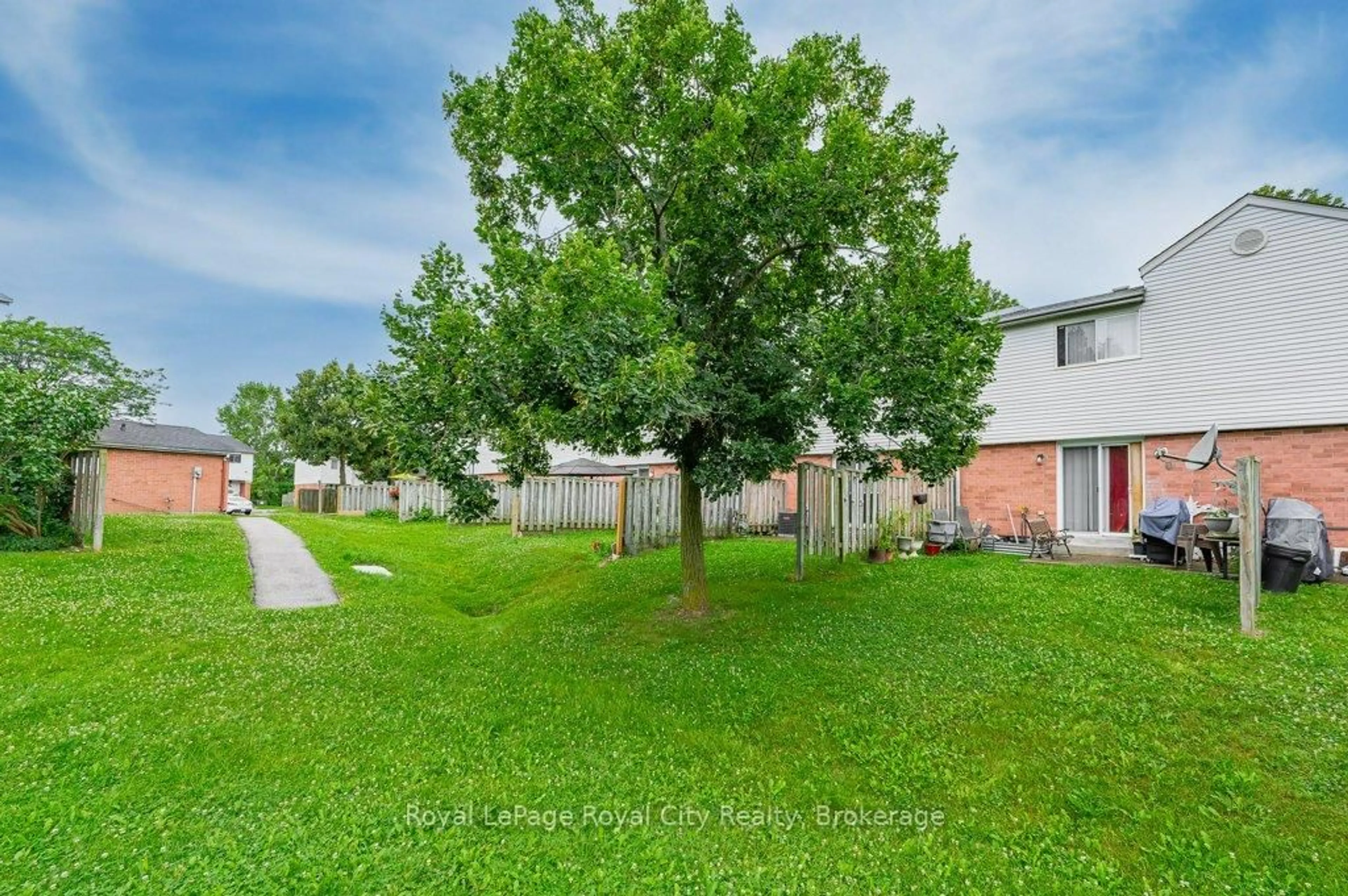 A pic from outside/outdoor area/front of a property/back of a property/a pic from drone, street for 40 Imperial Rd #6, Guelph Ontario N1H 8B4