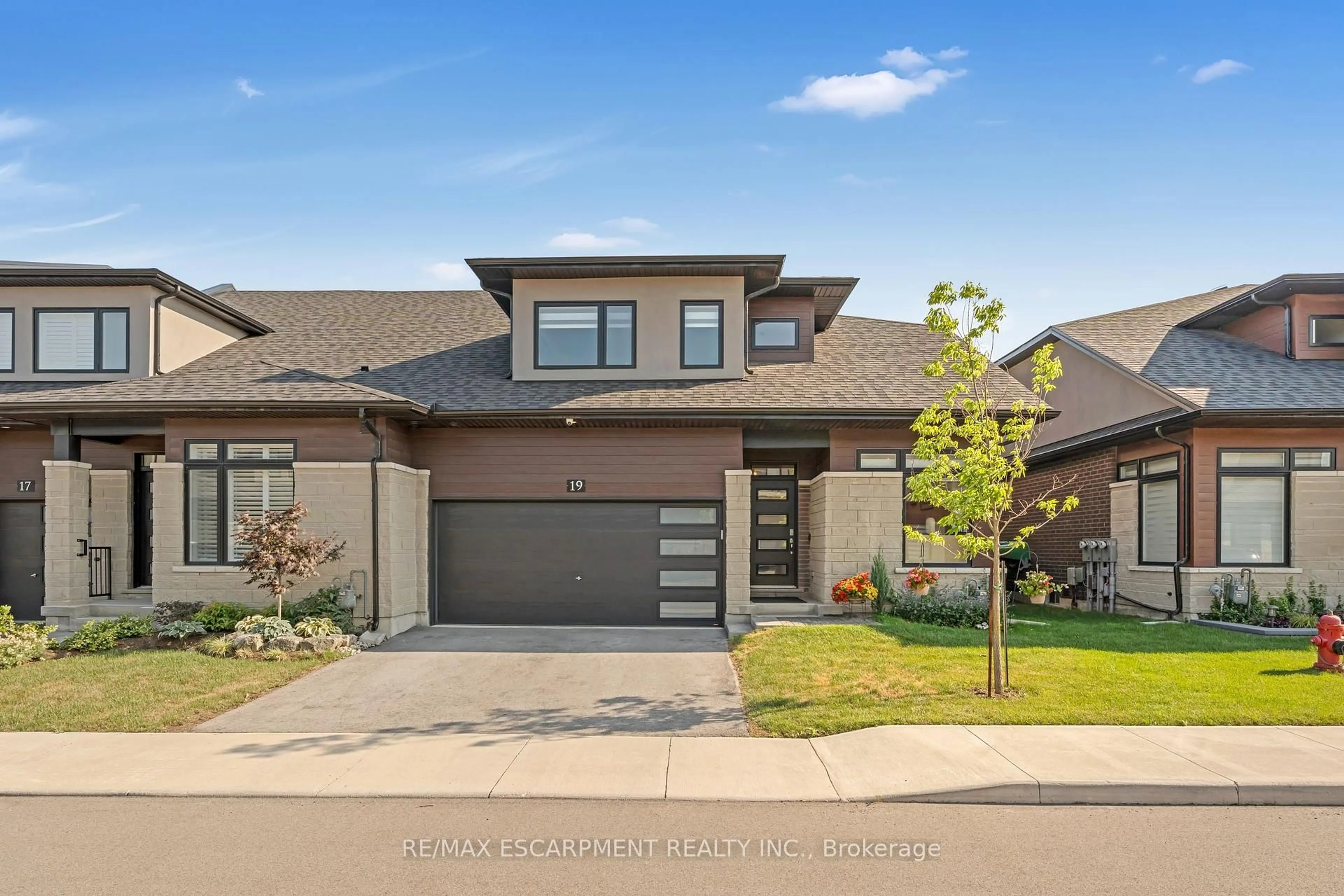 Home with brick exterior material, street for 19 Welch Lane, Hamilton Ontario L9C 0G1