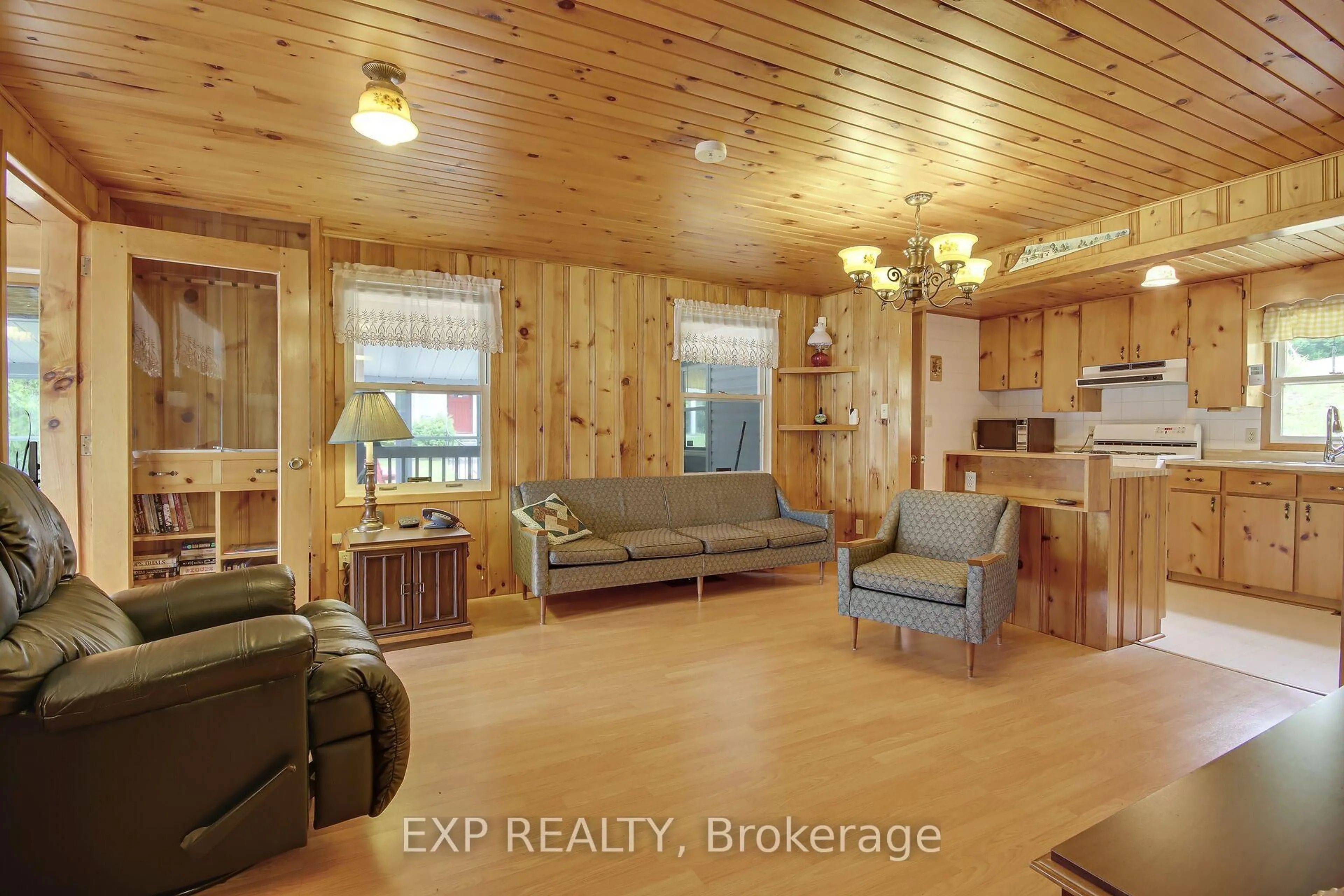 Living room with furniture, wood/laminate floor for 1876 FLOWER STATION Rd, Lanark Ontario K0G 1K0