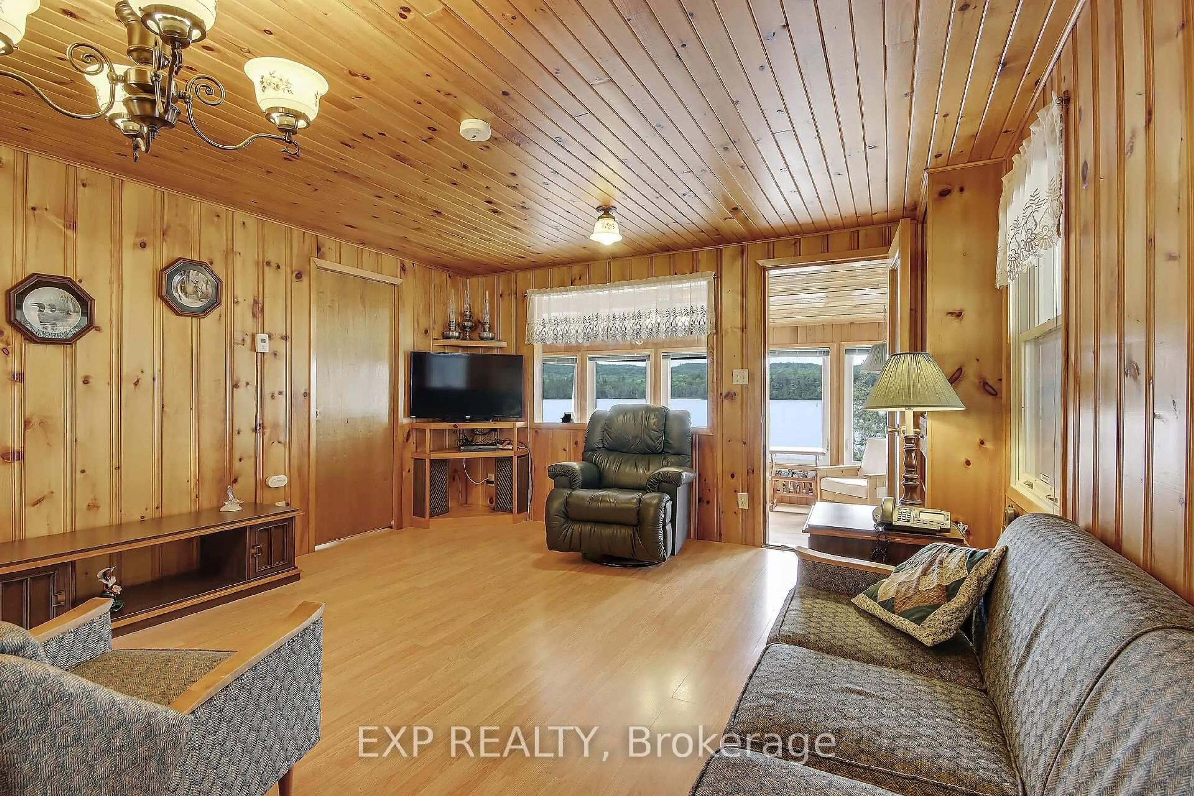Living room with furniture, wood/laminate floor for 1876 FLOWER STATION Rd, Lanark Ontario K0G 1K0
