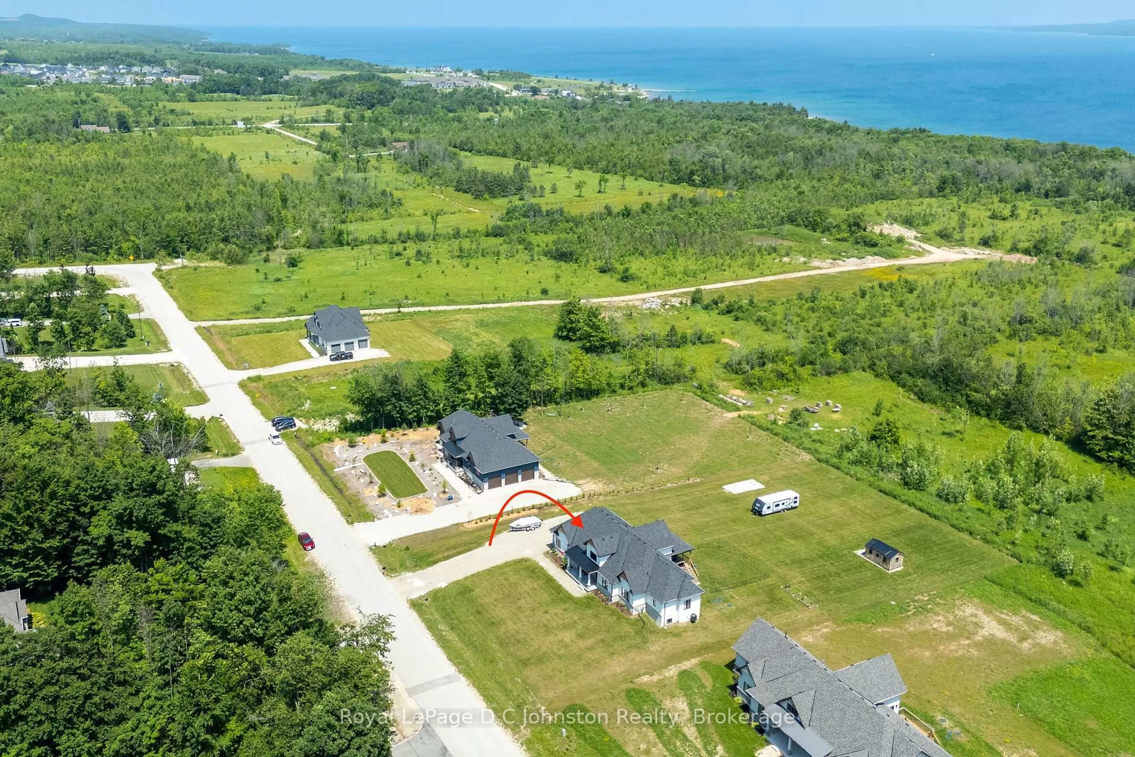 A pic from outside/outdoor area/front of a property/back of a property/a pic from drone, water/lake/river/ocean view for 167 Alexandria St, Georgian Bluffs Ontario N4K 0G2