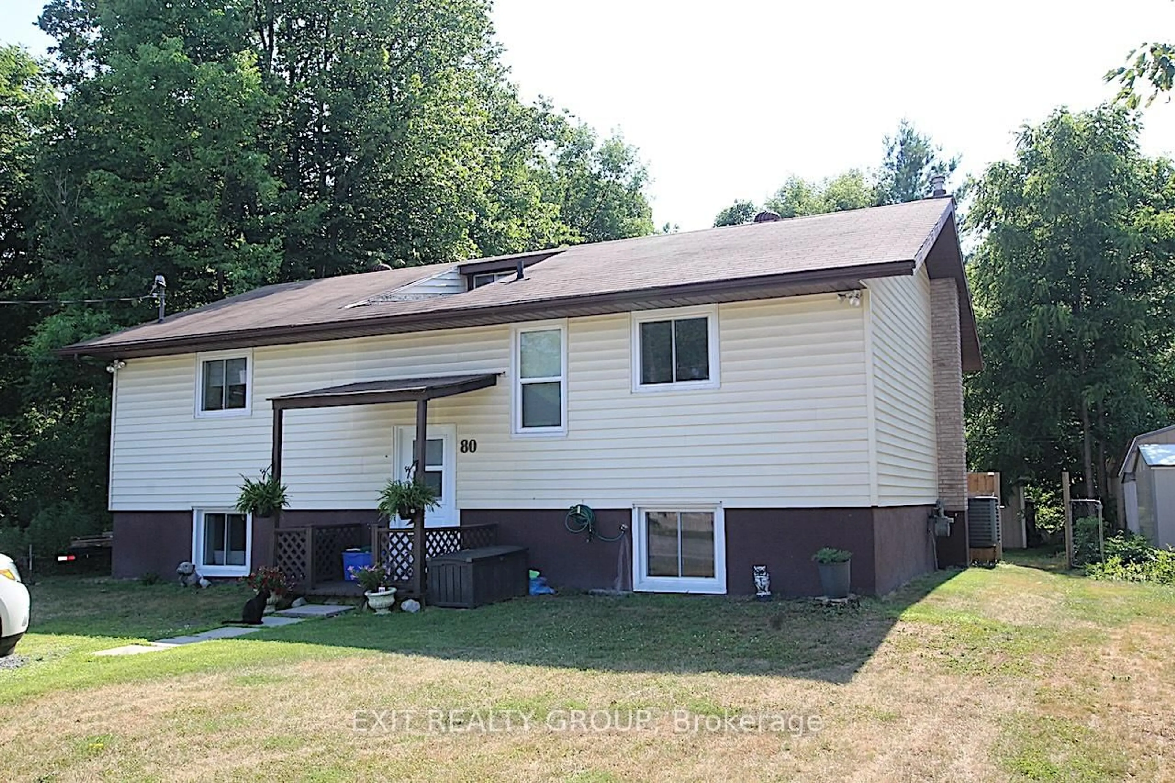 Home with vinyl exterior material, street for 80 Rollins St, Madoc Ontario K0K 2K0