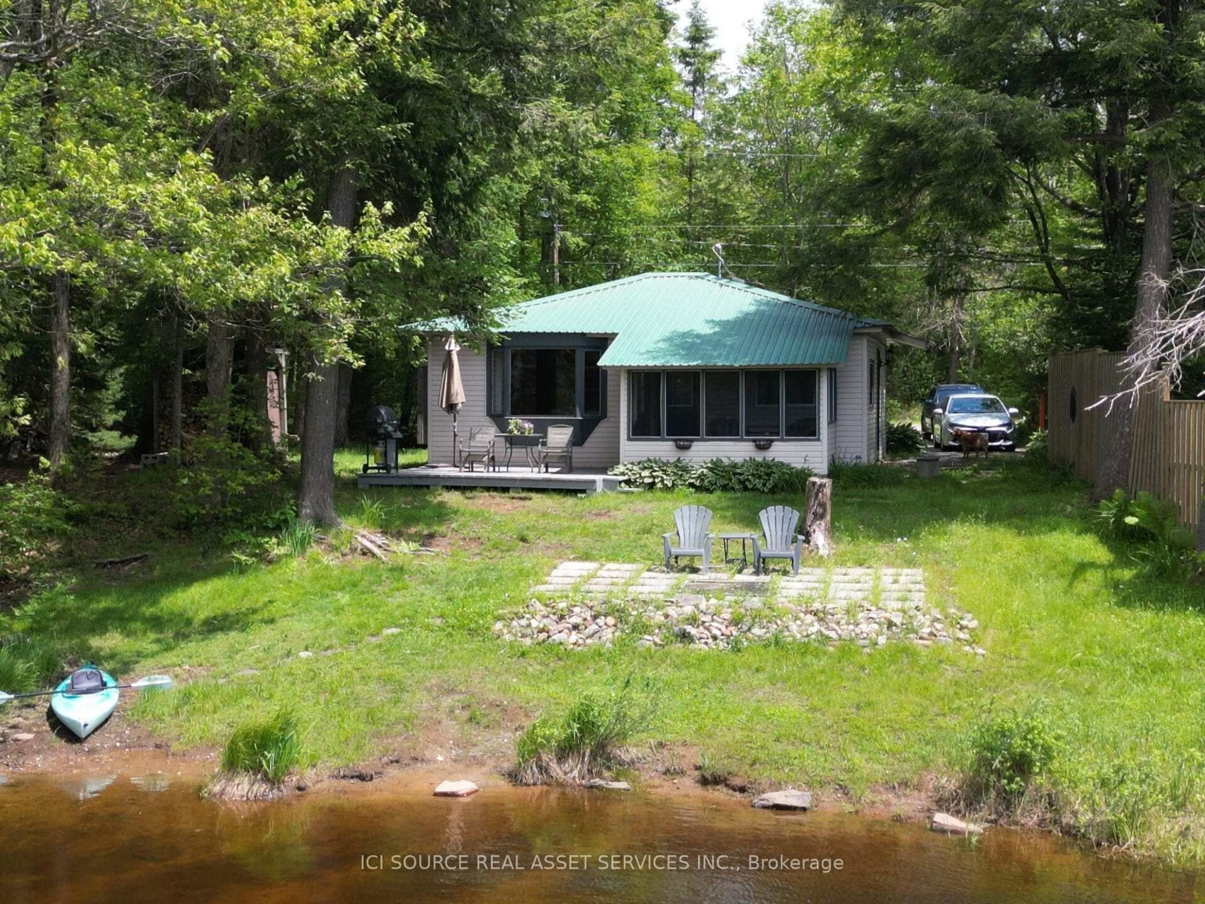 A pic from outside/outdoor area/front of a property/back of a property/a pic from drone, water/lake/river/ocean view for 1054 Keysbury Dr, Algonquin Highlands Ontario P0A 1H0