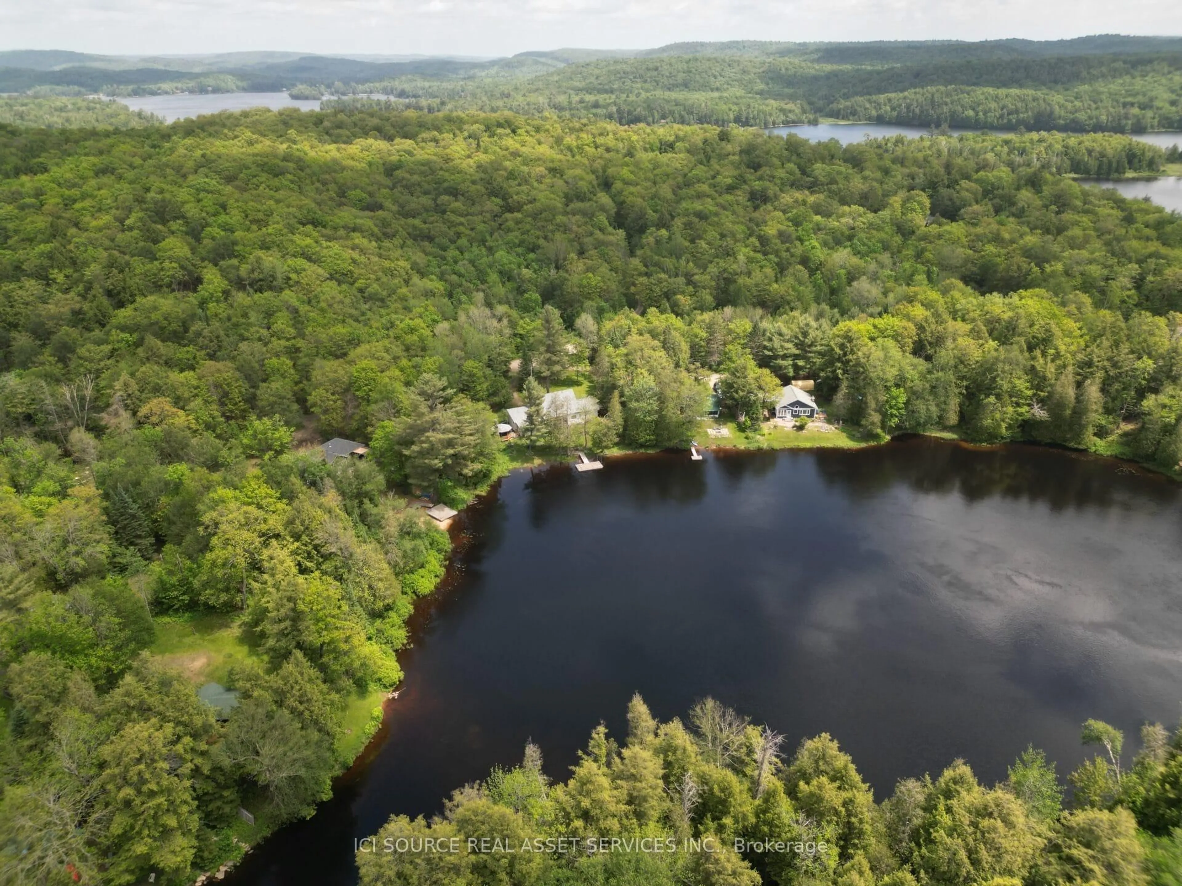 A pic from outside/outdoor area/front of a property/back of a property/a pic from drone, water/lake/river/ocean view for 1054 Keysbury Dr, Algonquin Highlands Ontario P0A 1H0