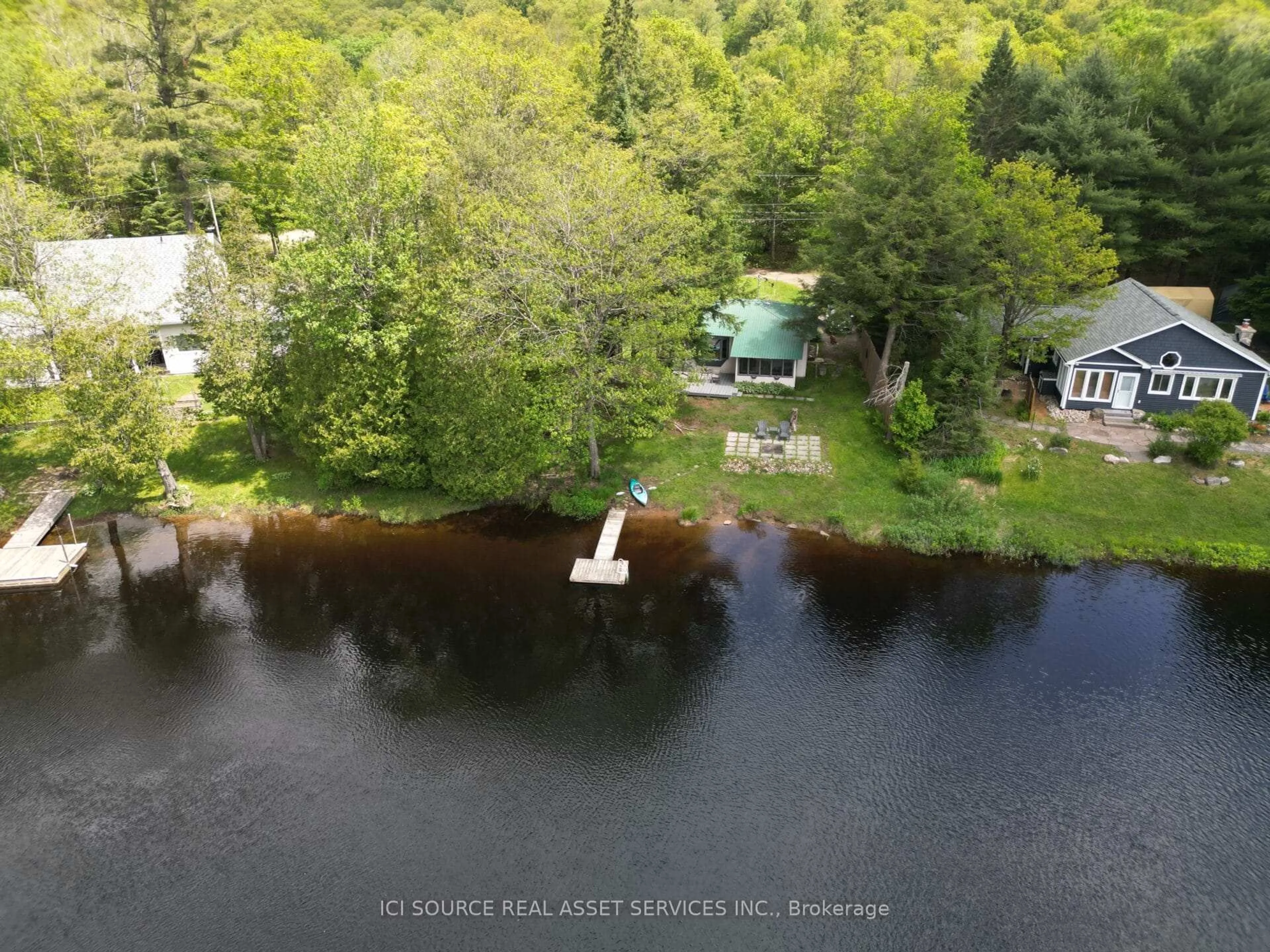 A pic from outside/outdoor area/front of a property/back of a property/a pic from drone, water/lake/river/ocean view for 1054 Keysbury Dr, Algonquin Highlands Ontario P0A 1H0