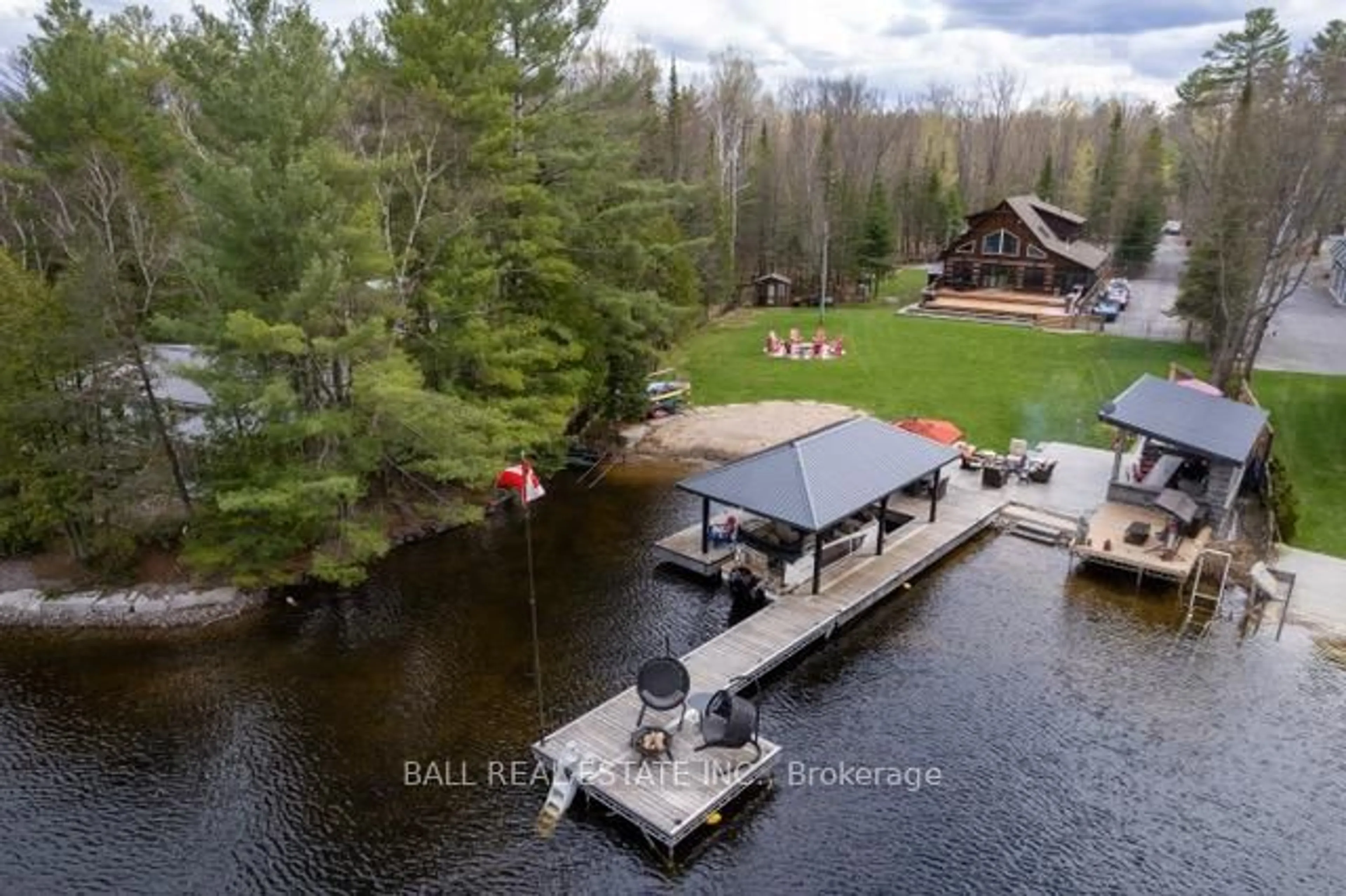 A pic from outside/outdoor area/front of a property/back of a property/a pic from drone, water/lake/river/ocean view for 1726 South Bay Shore Rd, Douro-Dummer Ontario K0L 2H0