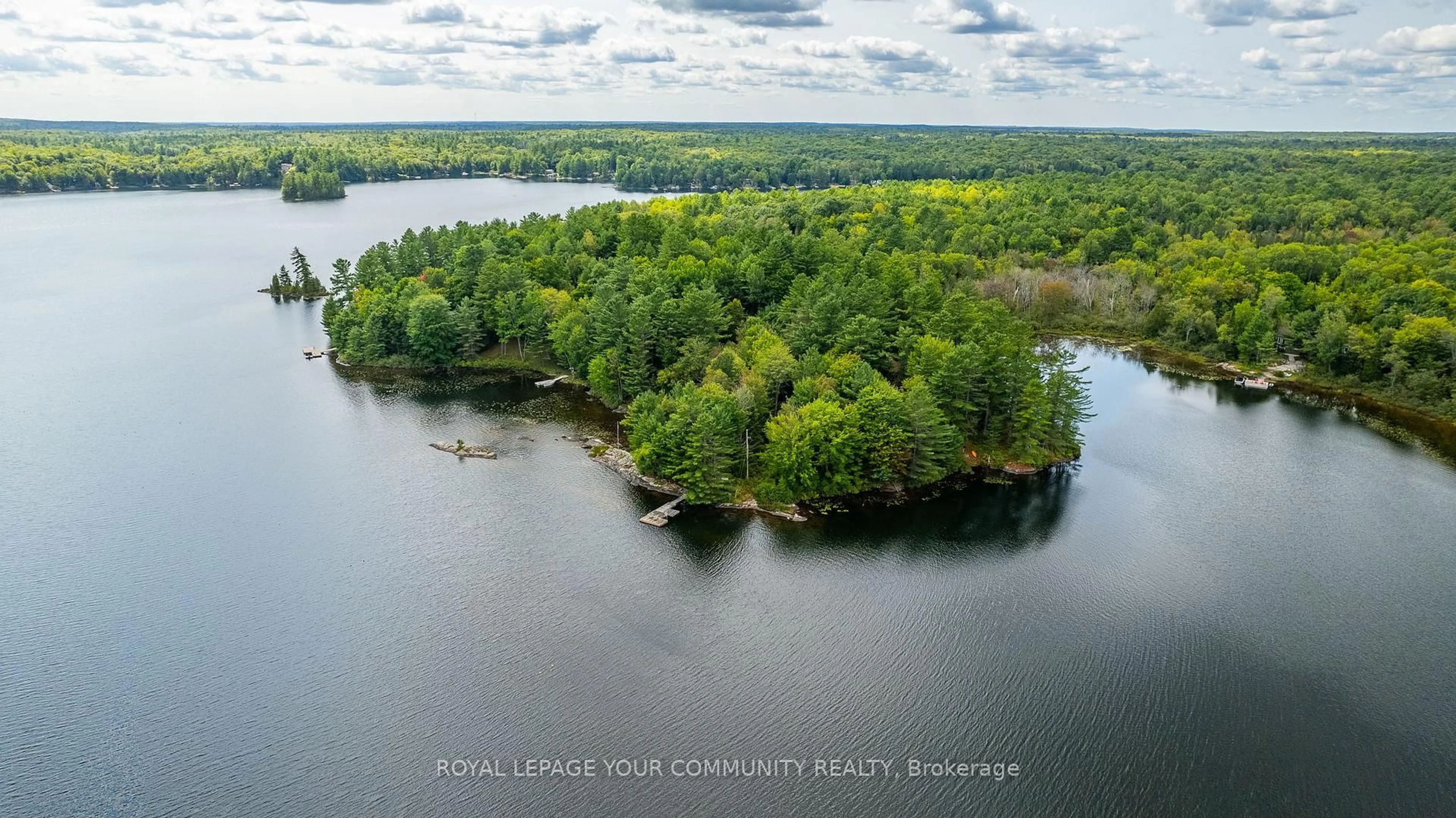 A pic from outside/outdoor area/front of a property/back of a property/a pic from drone, water/lake/river/ocean view for 1031 Obelisk Tr, Minden Hills Ontario K0M 2A0