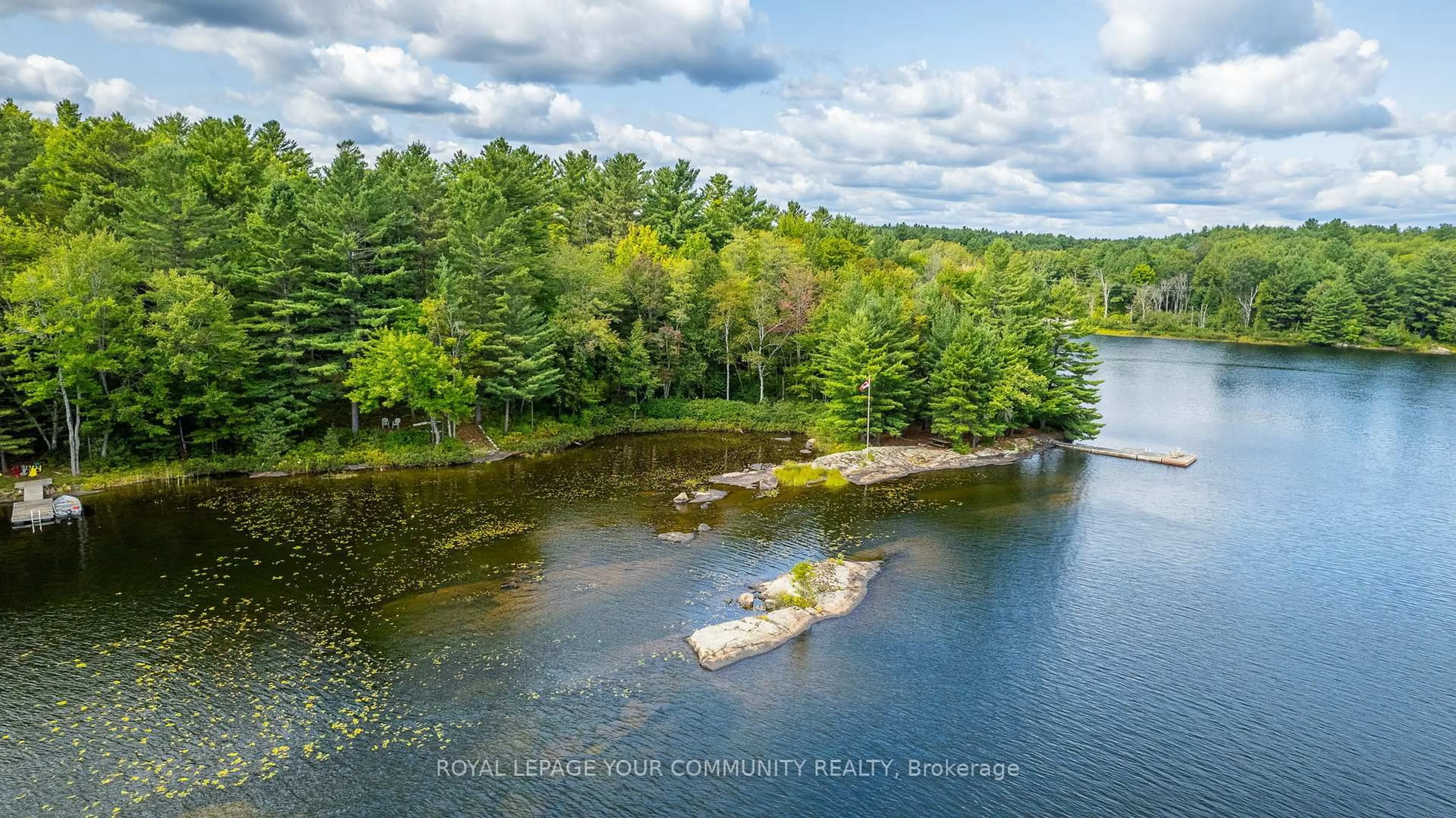 A pic from outside/outdoor area/front of a property/back of a property/a pic from drone, water/lake/river/ocean view for 1031 Obelisk Tr, Minden Hills Ontario K0M 2A0