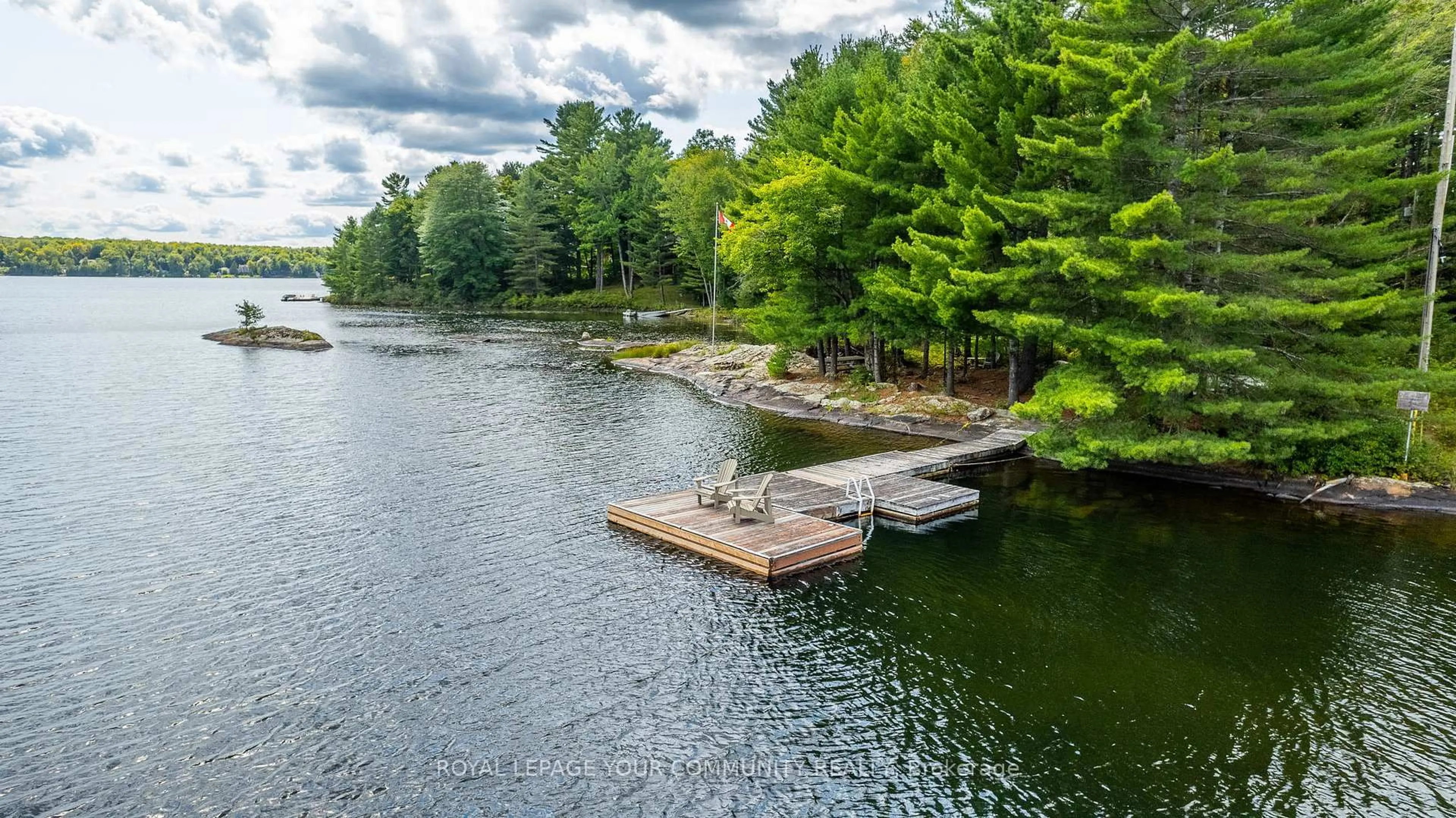 A pic from outside/outdoor area/front of a property/back of a property/a pic from drone, water/lake/river/ocean view for 1031 Obelisk Tr, Minden Hills Ontario K0M 2A0