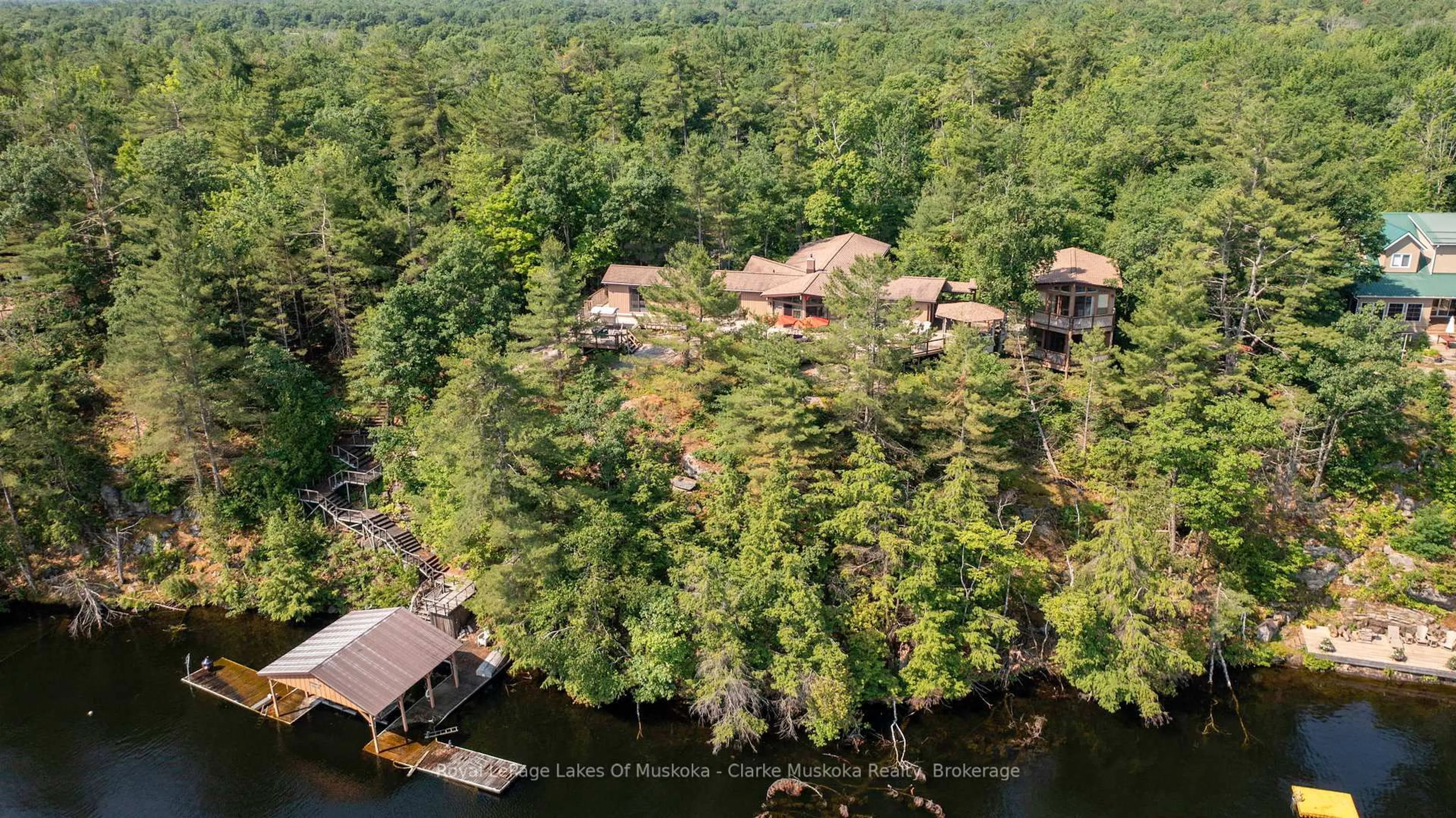A pic from outside/outdoor area/front of a property/back of a property/a pic from drone, water/lake/river/ocean view for 104 POINTS OF VIEW Rd, Georgian Bay Ontario L0K 1S0