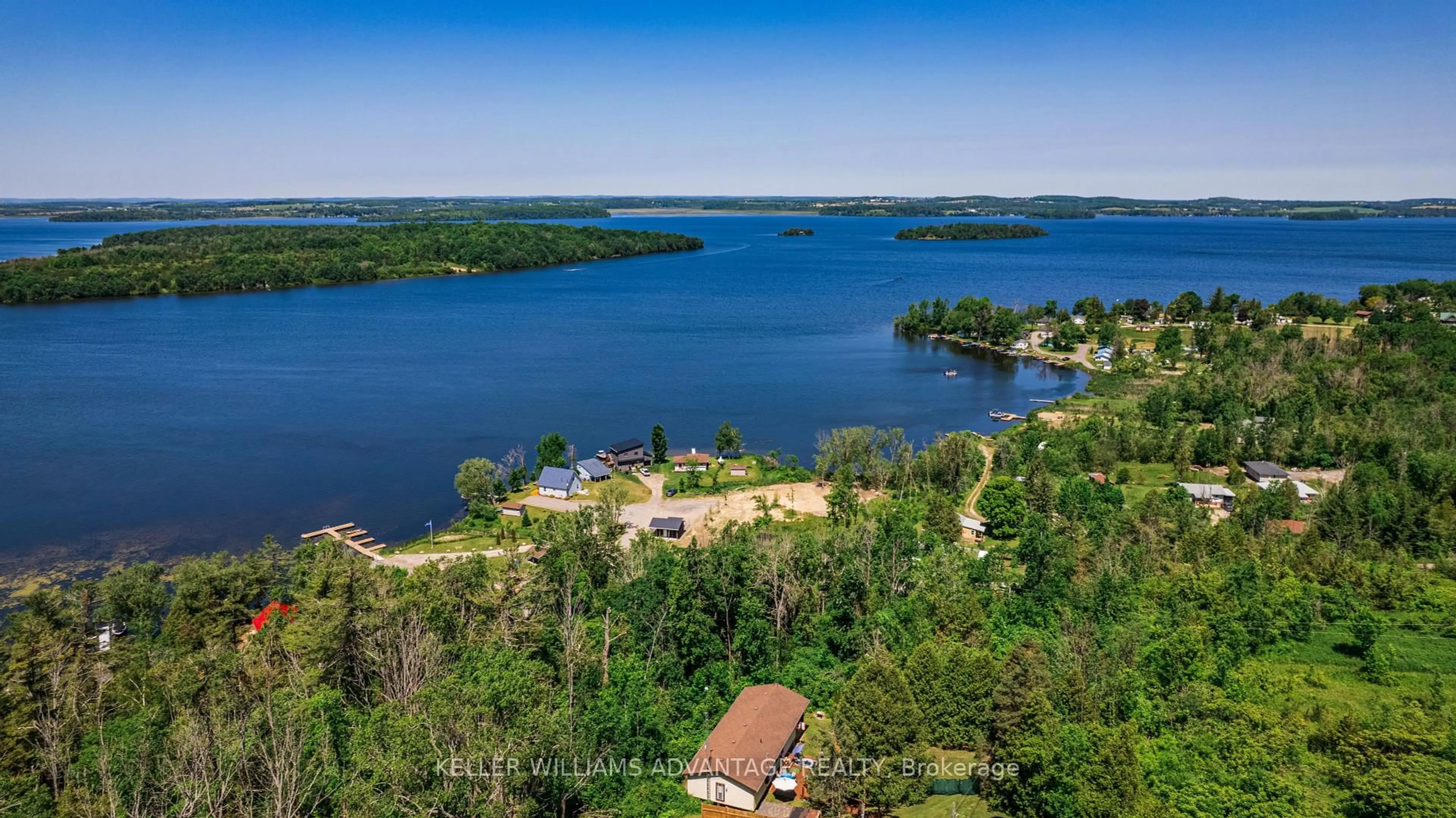 A pic from outside/outdoor area/front of a property/back of a property/a pic from drone, water/lake/river/ocean view for 18 4th Line Rd #5, Alnwick/Haldimand Ontario K0K 2X0