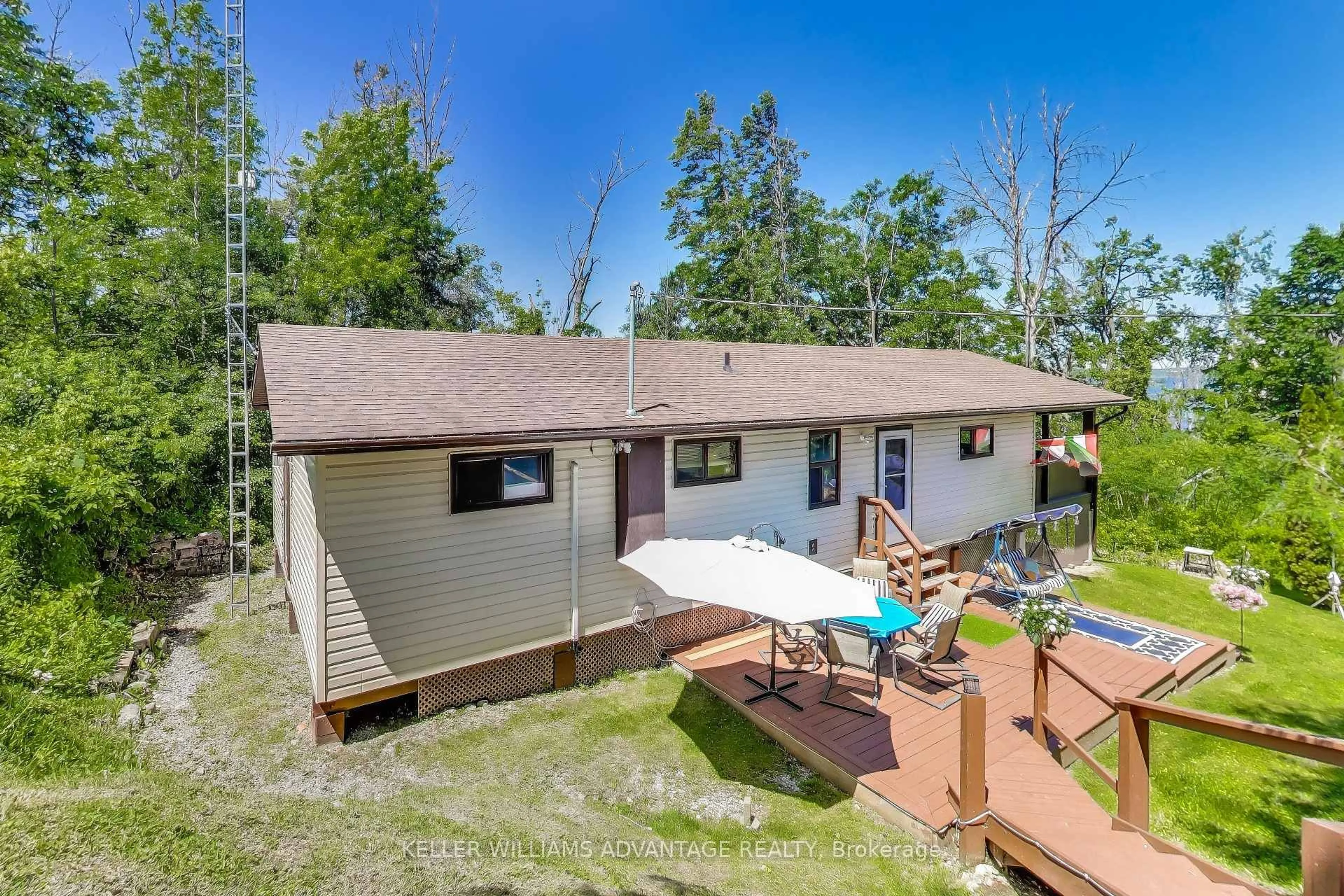 A pic from outside/outdoor area/front of a property/back of a property/a pic from drone, water/lake/river/ocean view for 18 4th Line Rd #5, Alnwick/Haldimand Ontario K0K 2X0