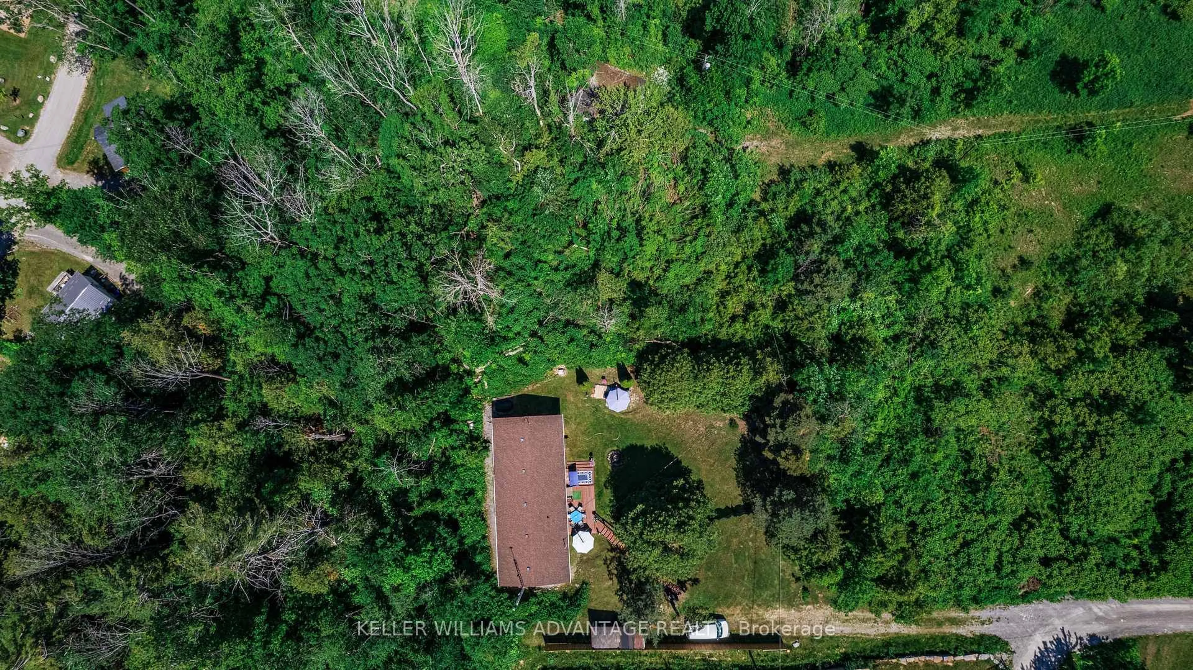 A pic from outside/outdoor area/front of a property/back of a property/a pic from drone, forest/trees view for 18 4th Line Rd #5, Alnwick/Haldimand Ontario K0K 2X0