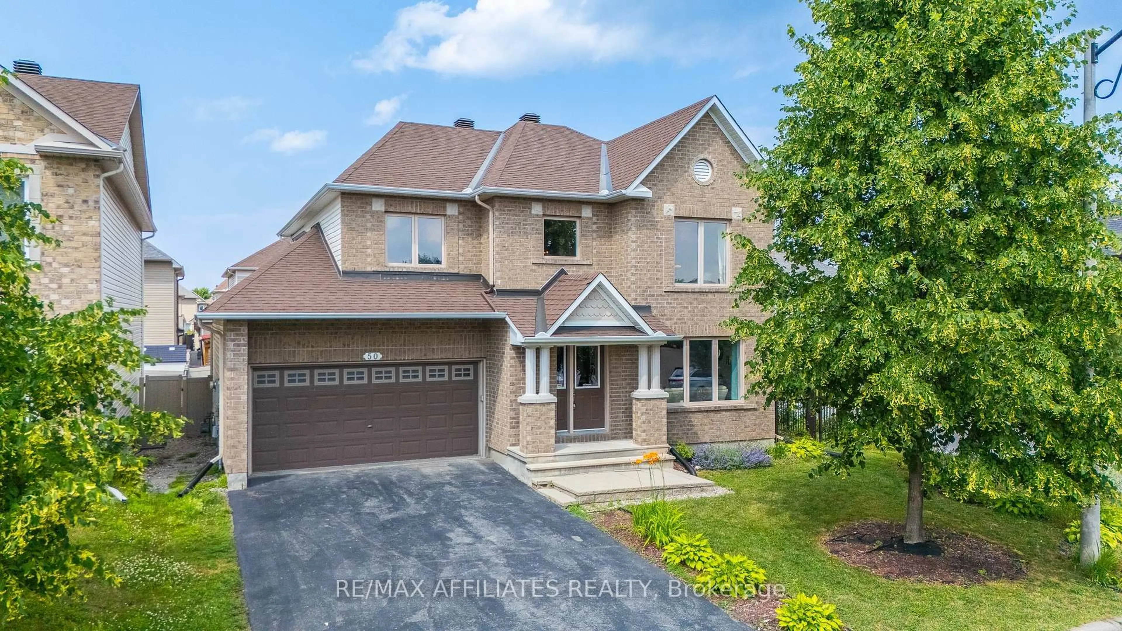 Home with brick exterior material, street for 50 Cormack Circ, Ottawa Ontario K2J 0H8