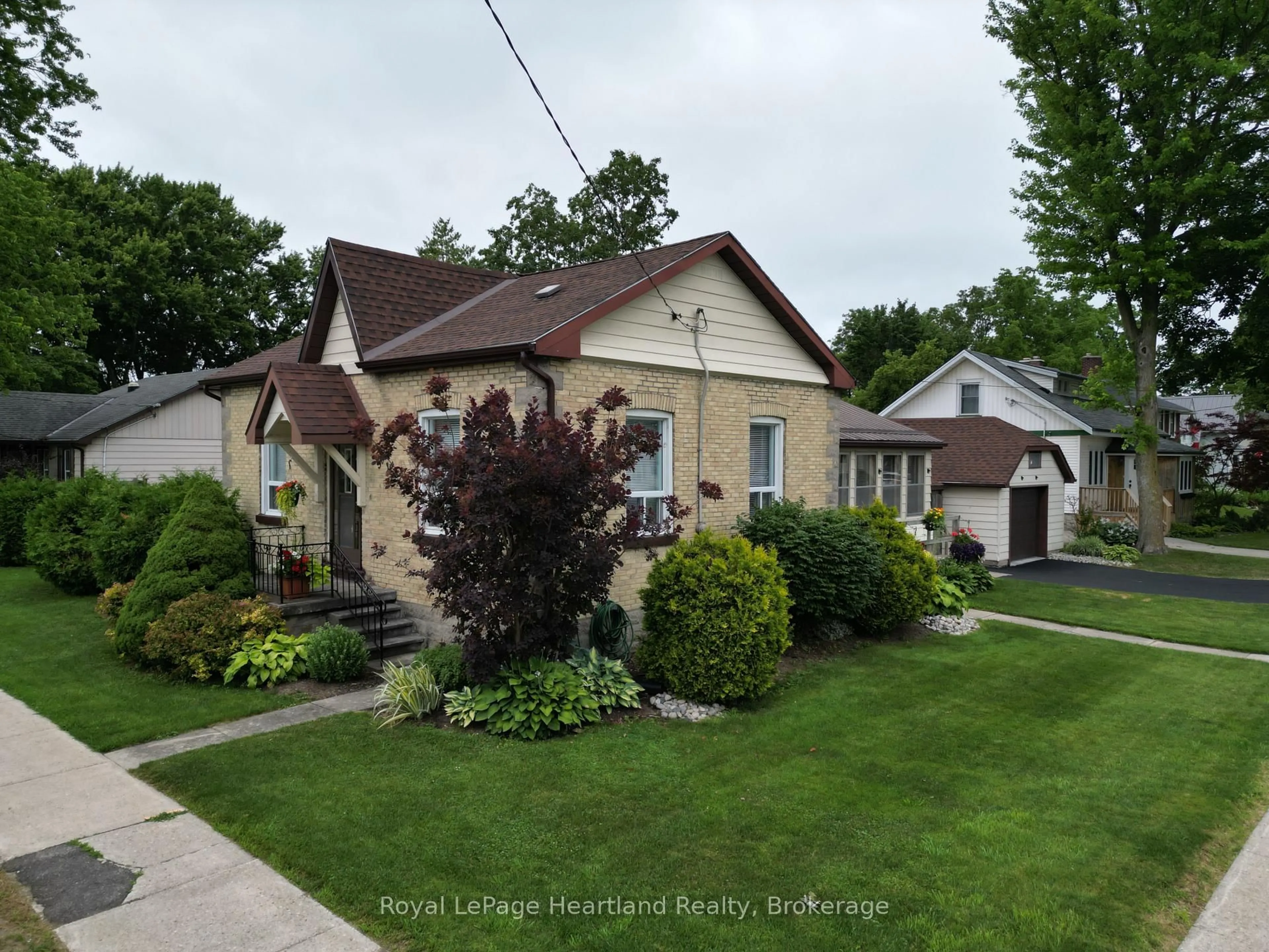 A pic from outside/outdoor area/front of a property/back of a property/a pic from drone, street for 46 Gidley St, South Huron Ontario N0M 1S2