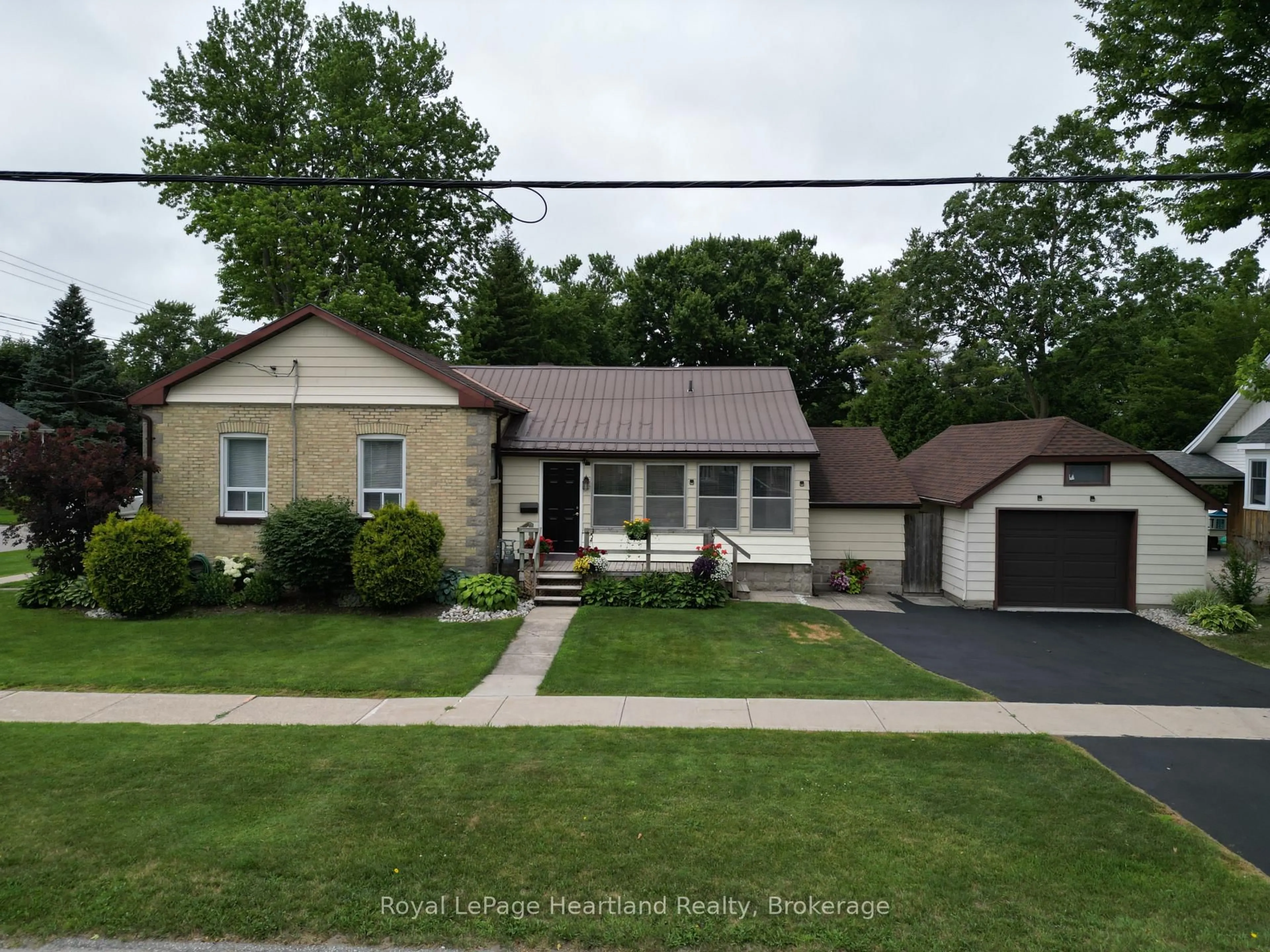 Home with brick exterior material, street for 46 Gidley St, South Huron Ontario N0M 1S2