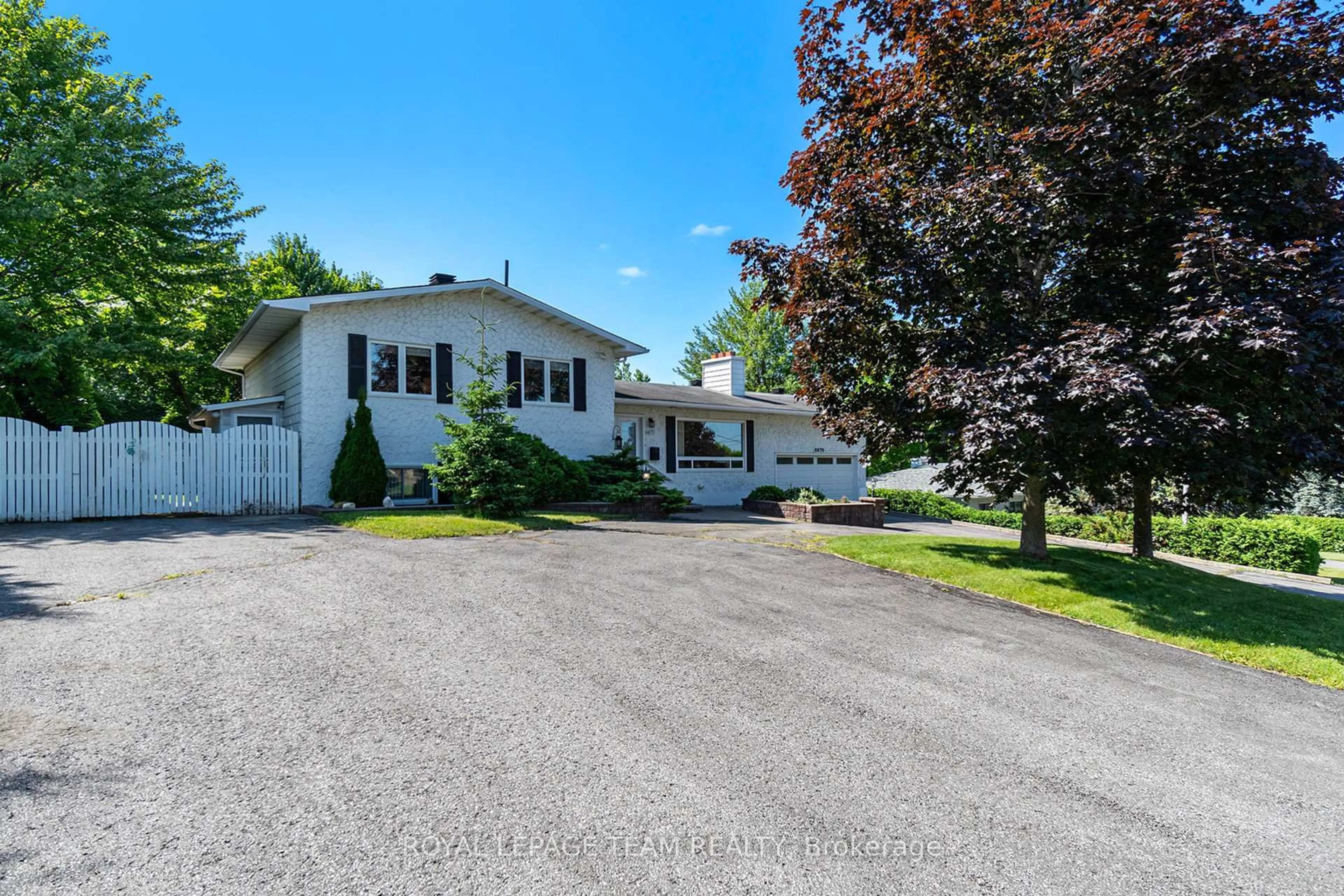 A pic from outside/outdoor area/front of a property/back of a property/a pic from drone, street for 6870 Edgar Brault St, Orleans Ontario K1C 1L7