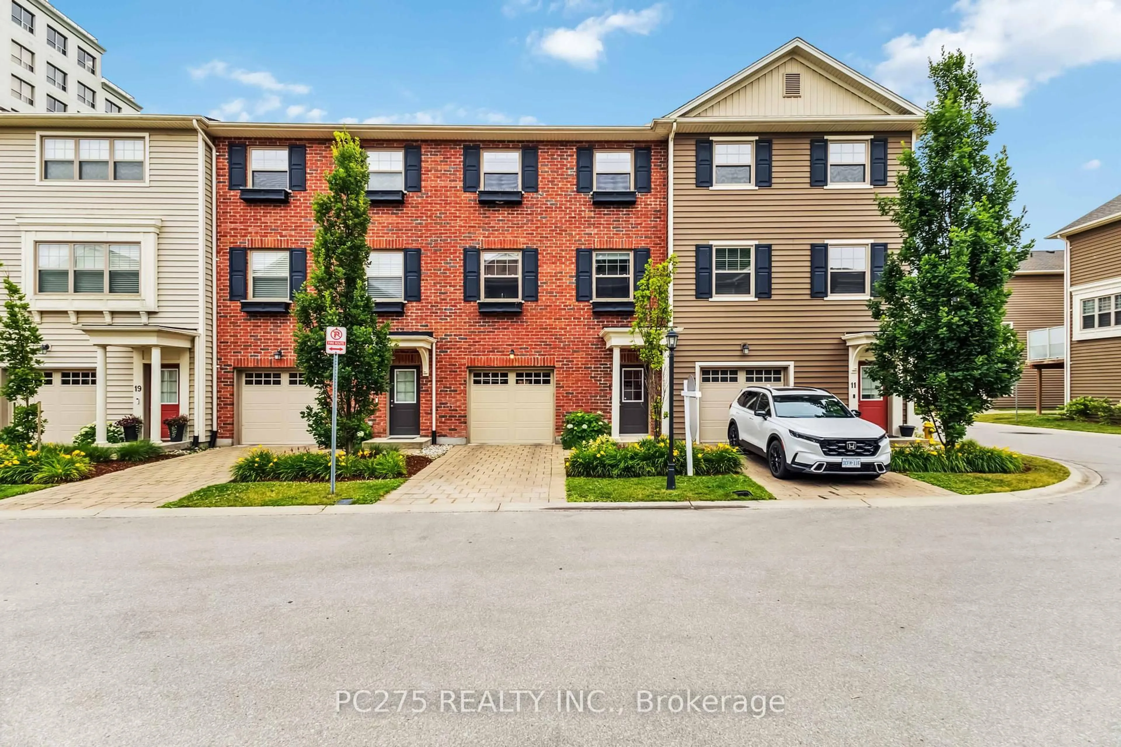 A pic from outside/outdoor area/front of a property/back of a property/a pic from drone, street for 1040 Coronation Dr #15, London North Ontario N6G 0R8