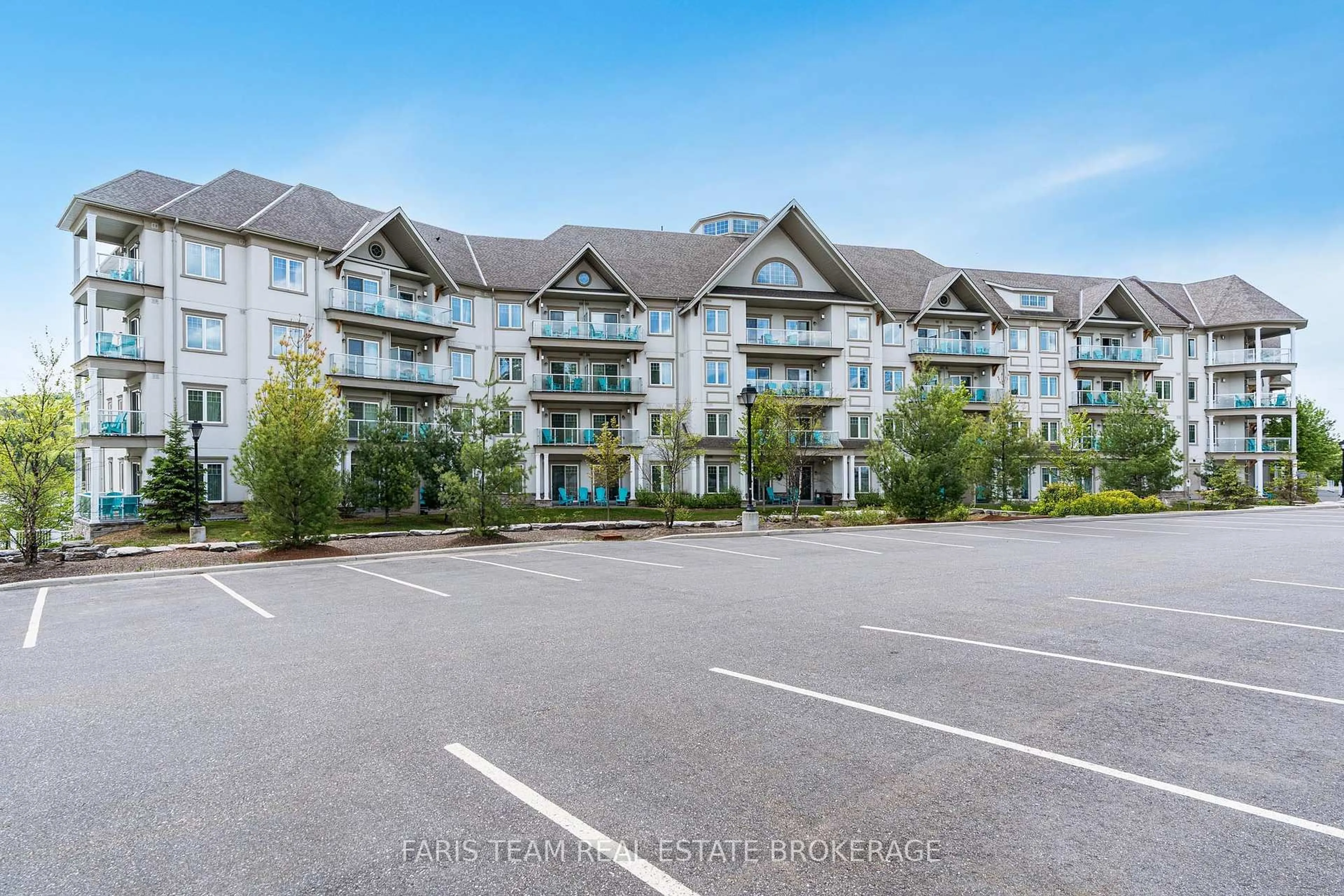 A pic from outside/outdoor area/front of a property/back of a property/a pic from drone, unknown for 25 Pen Lake Point Rd #218, Huntsville Ontario P1H 1A9