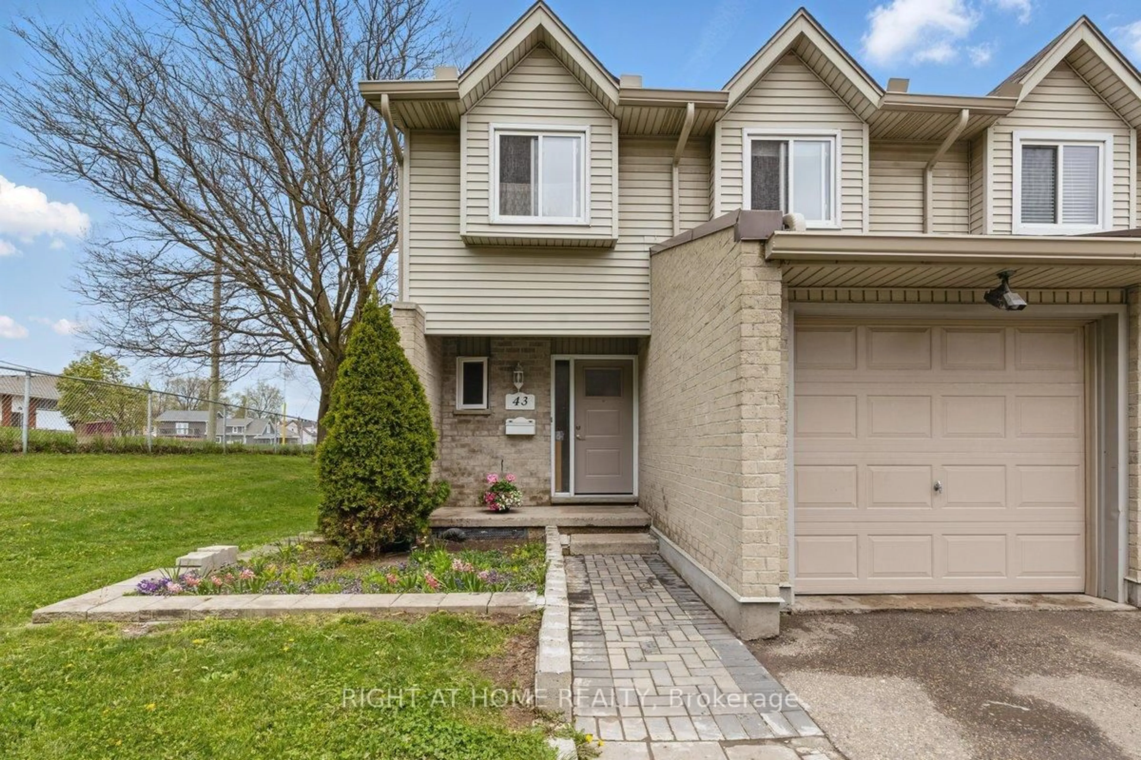 Home with vinyl exterior material, street for 20 Paulander Dr #43, Kitchener Ontario N2M 5L3