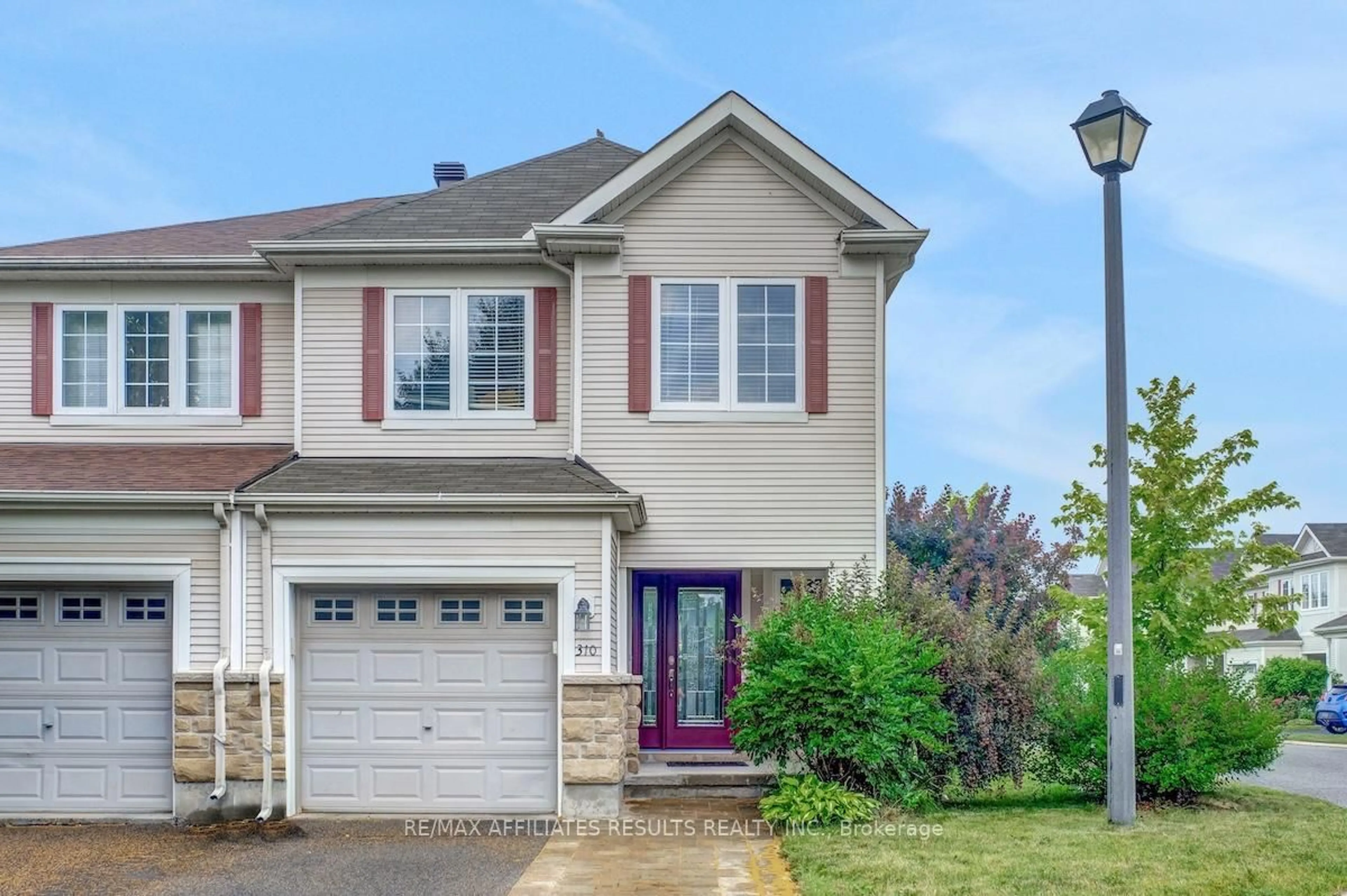 Home with vinyl exterior material, street for 310 Silbrass Private, Ottawa Ontario K2J 5M5