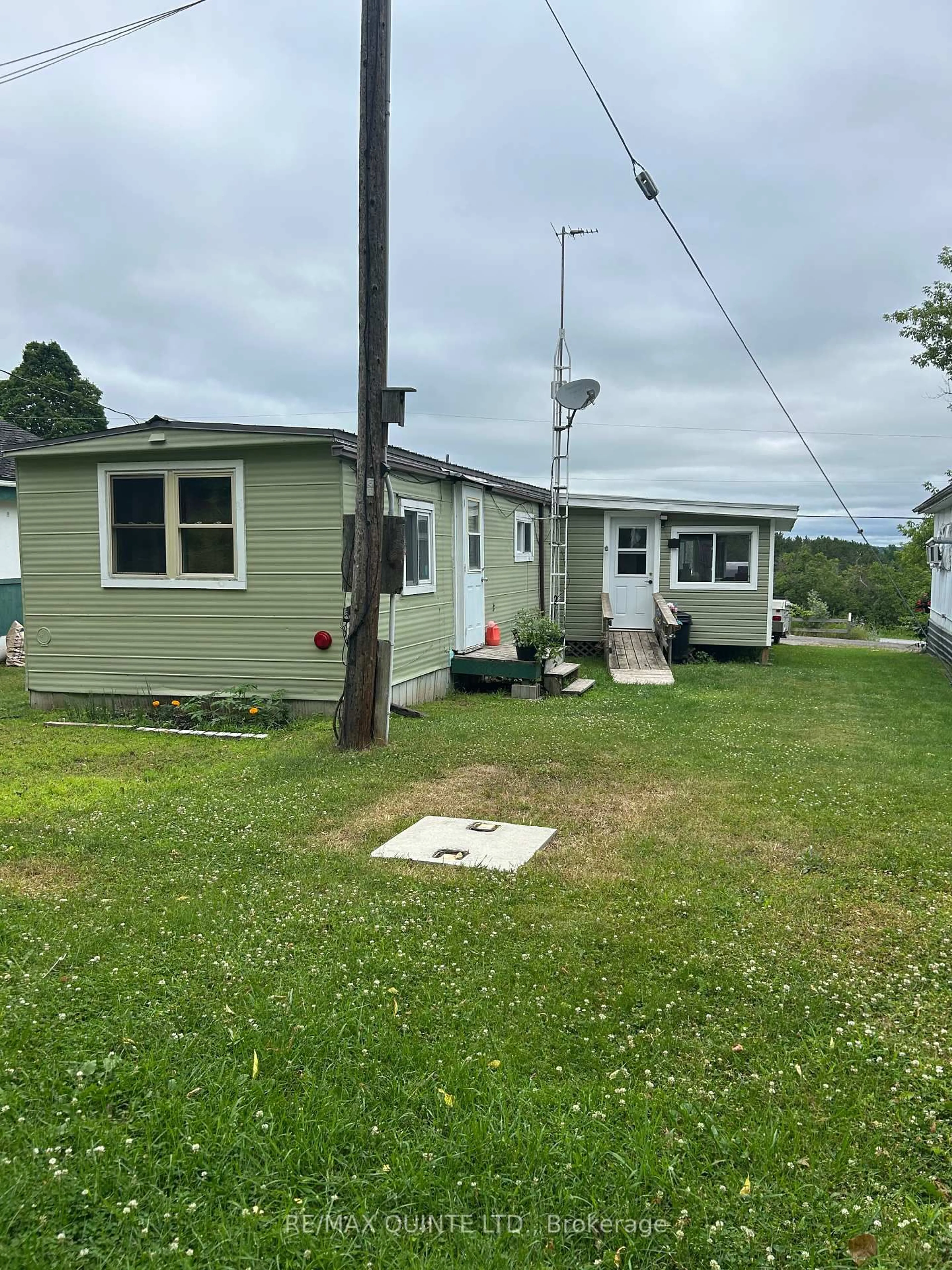 A pic from outside/outdoor area/front of a property/back of a property/a pic from drone, unknown for 223B Clare St, Thomasburg Ontario K0K 3H0