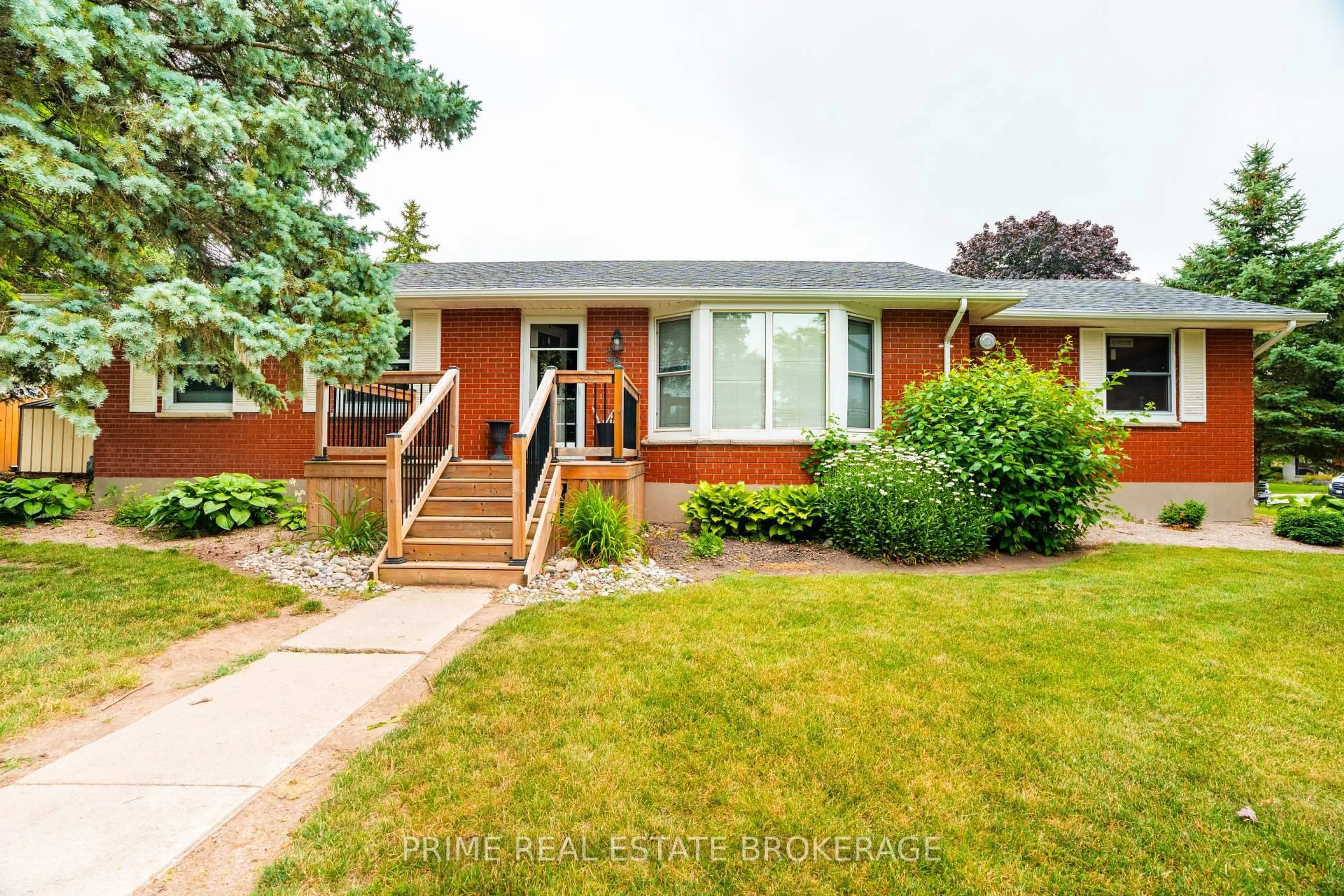 Home with brick exterior material, street for 36 Orchard St, South Huron Ontario N0M 1S3
