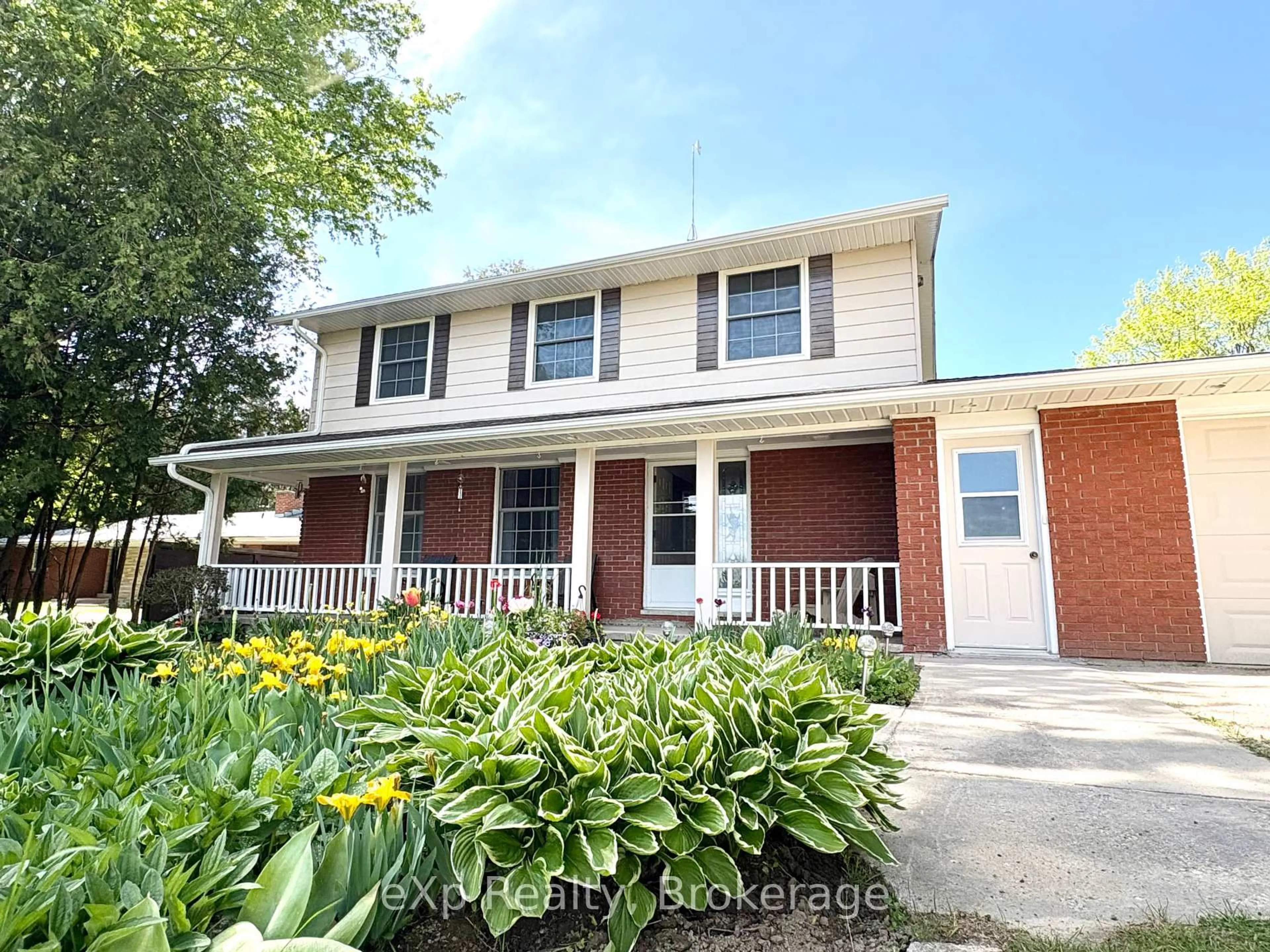 Home with vinyl exterior material, street for 401767 Grey Road 4 Rd, West Grey Ontario N4N 3B8
