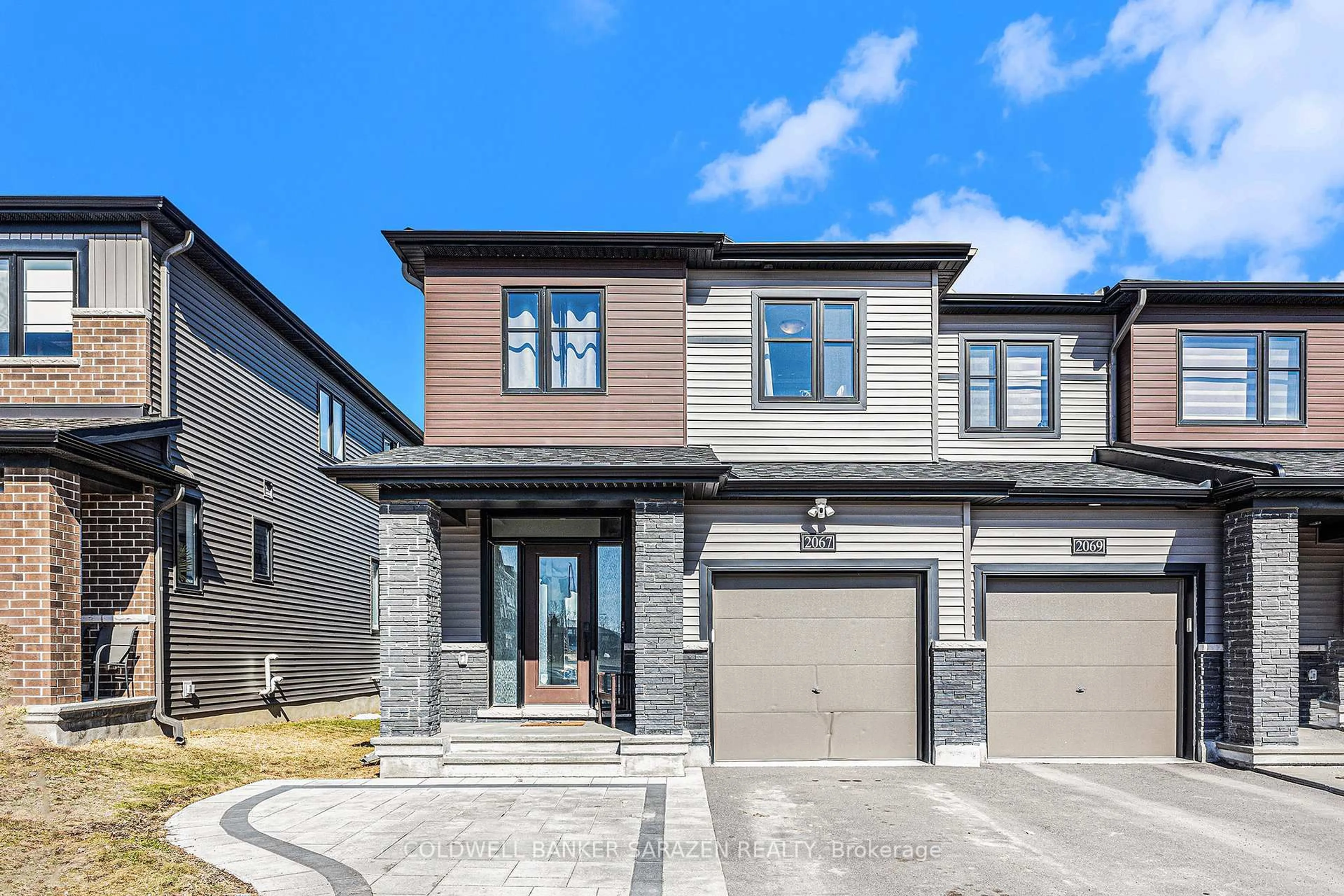 Home with brick exterior material, street for 2067 Caltra Cres, Ottawa Ontario K2J 6V5