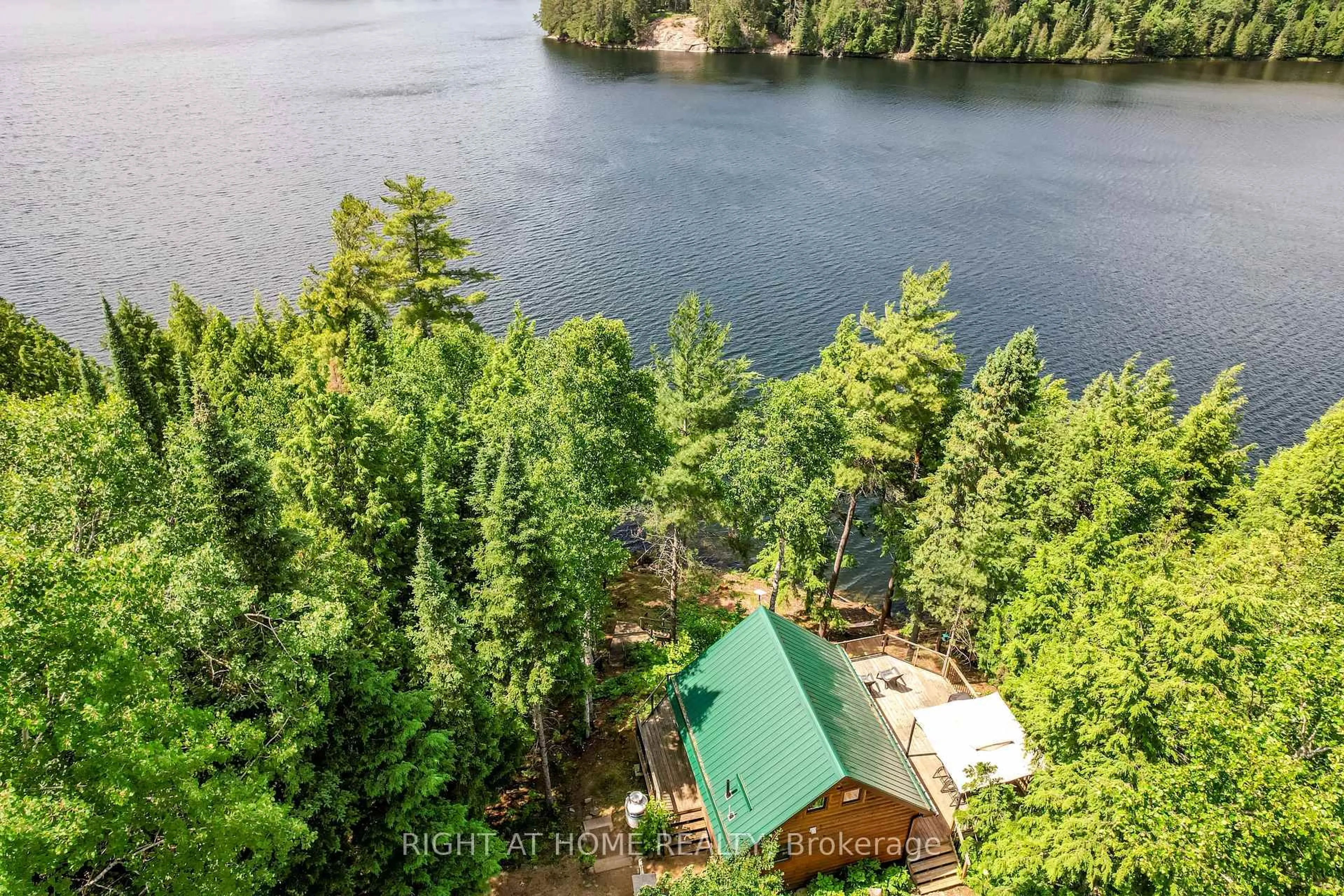 A pic from outside/outdoor area/front of a property/back of a property/a pic from drone, water/lake/river/ocean view for 592 Moccasin Lake Rd, Palmer Rapids Ontario K0J 2E0