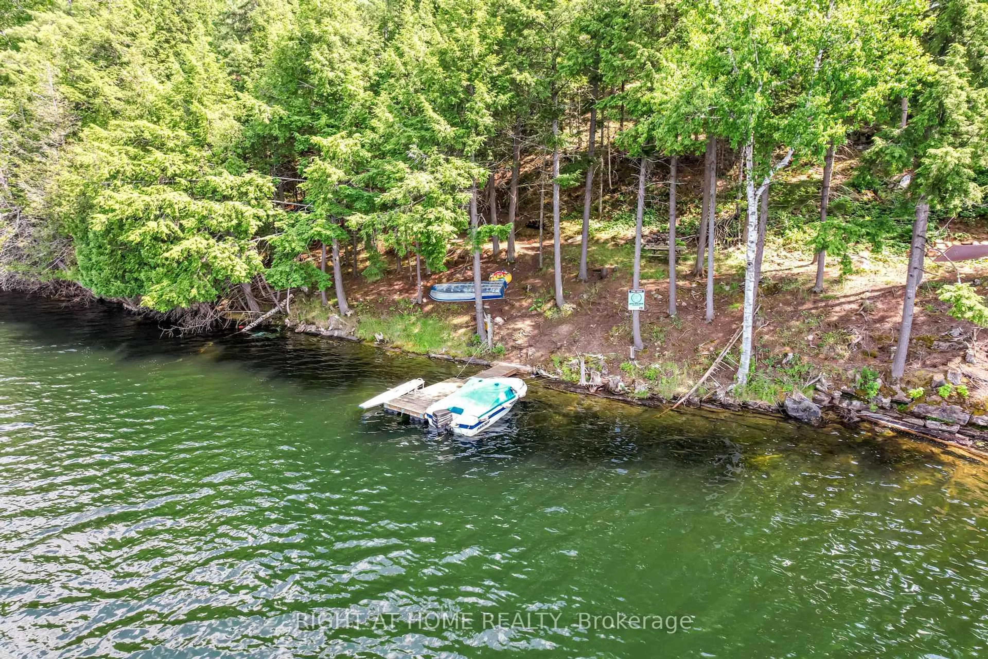 A pic from outside/outdoor area/front of a property/back of a property/a pic from drone, water/lake/river/ocean view for 592 Moccasin Lake Rd, Palmer Rapids Ontario K0J 2E0