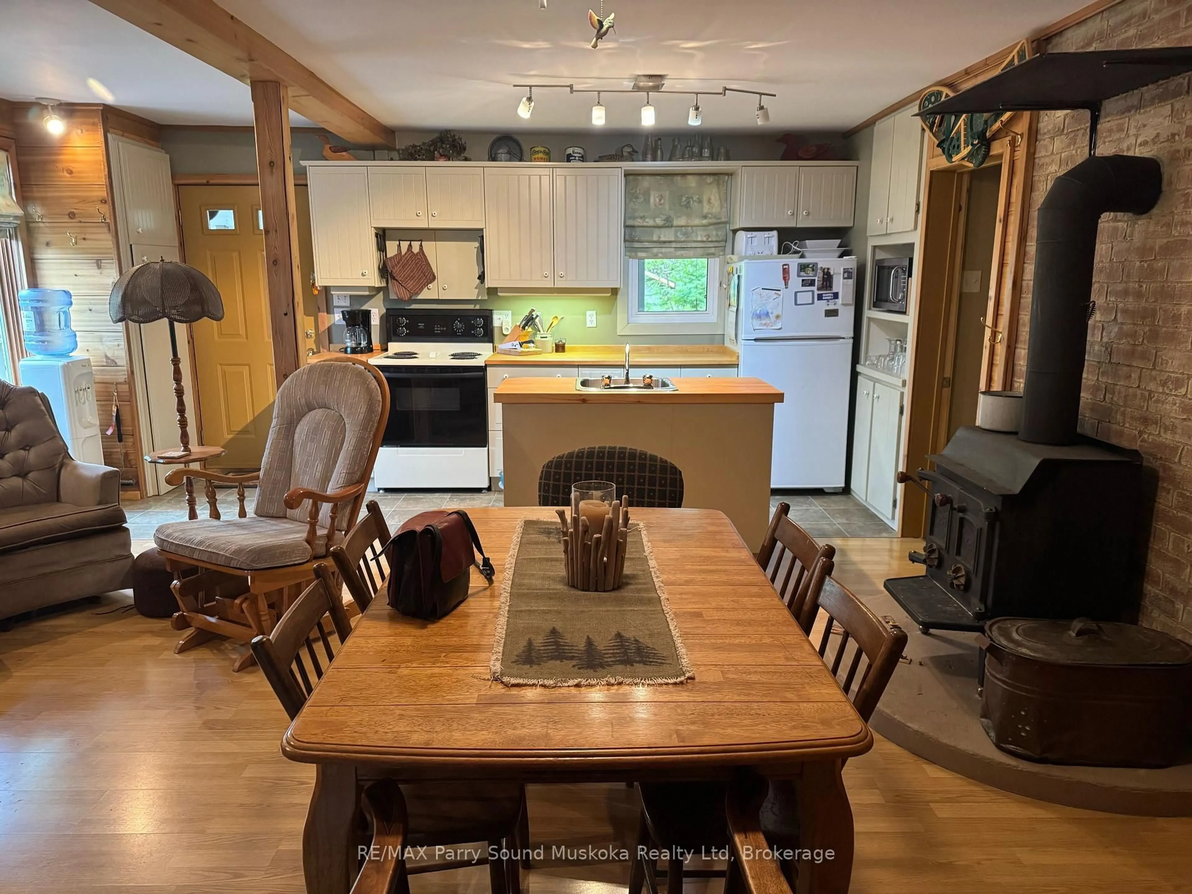 Open concept kitchen, wood/laminate floor for 1362 Ranger Bay Rd, Parry Sound Remote Area Ontario P0H 1S0