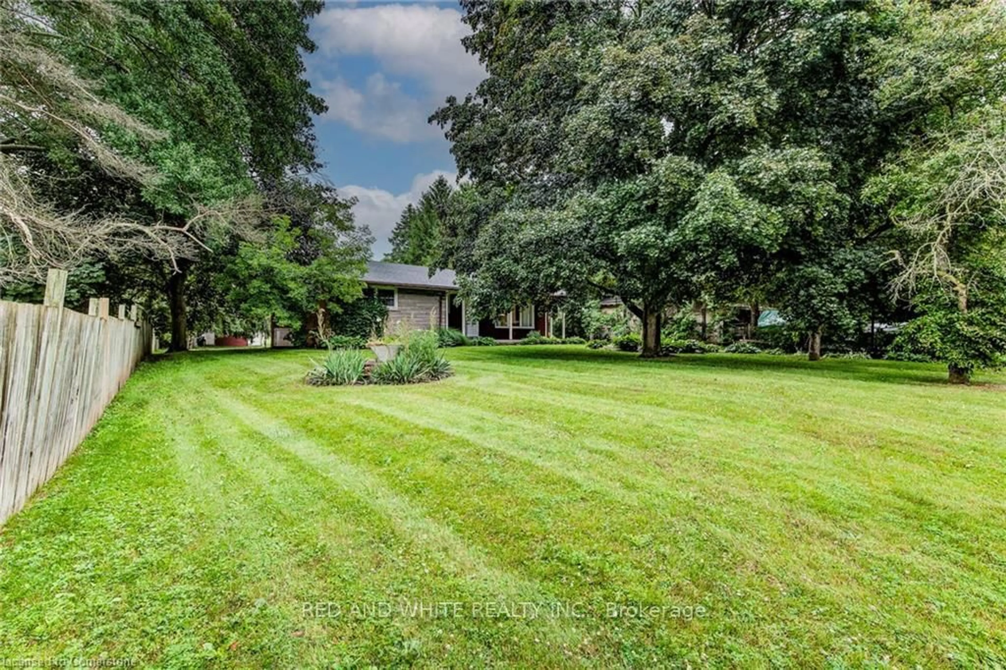 A pic from outside/outdoor area/front of a property/back of a property/a pic from drone, unknown for 33 Golf Course Rd Rd, Woolwich Ontario N0B 1N0