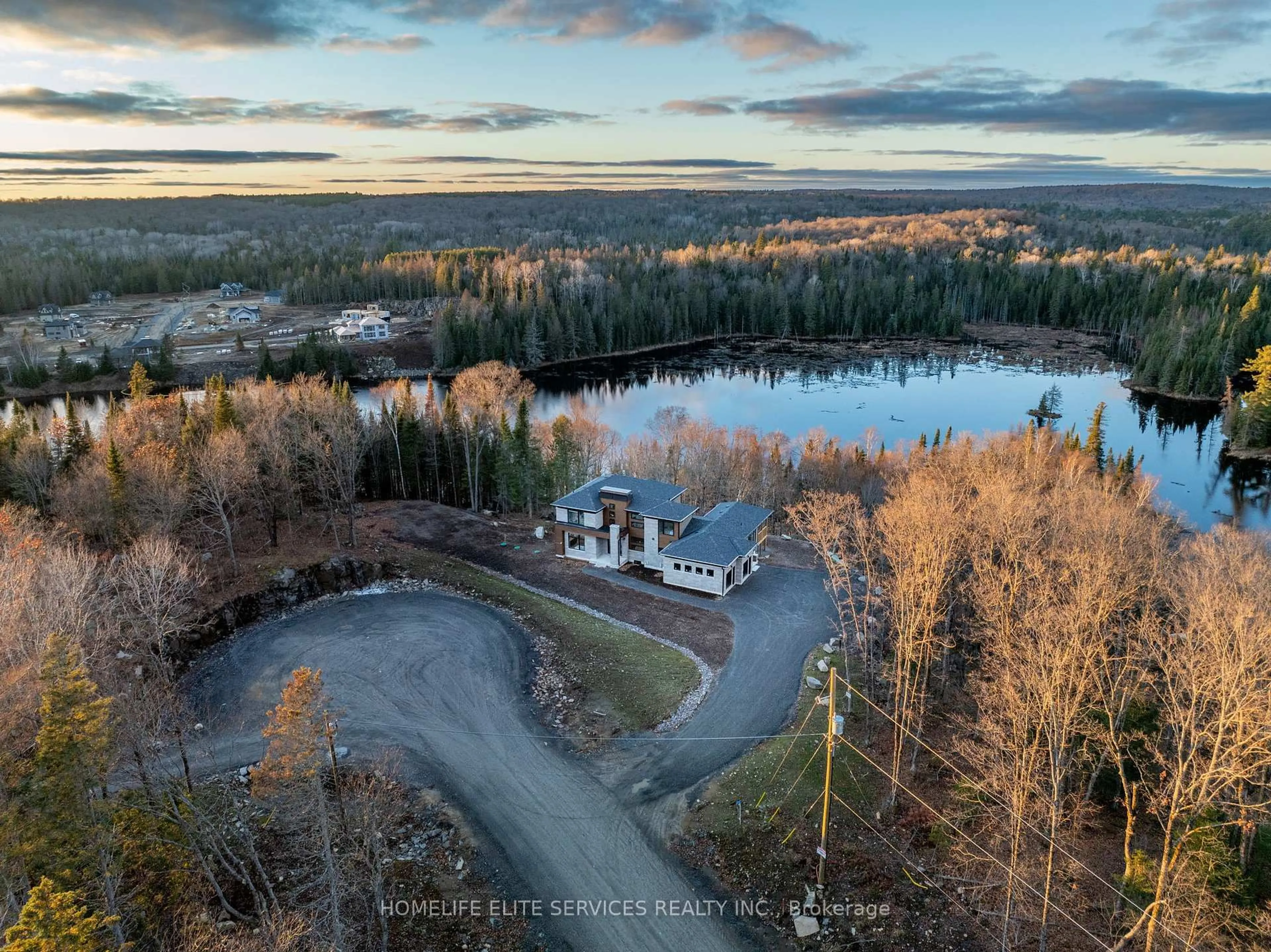A pic from outside/outdoor area/front of a property/back of a property/a pic from drone, water/lake/river/ocean view for 1008 Napier Crt, Lake of Bays Ontario P1H 0K1
