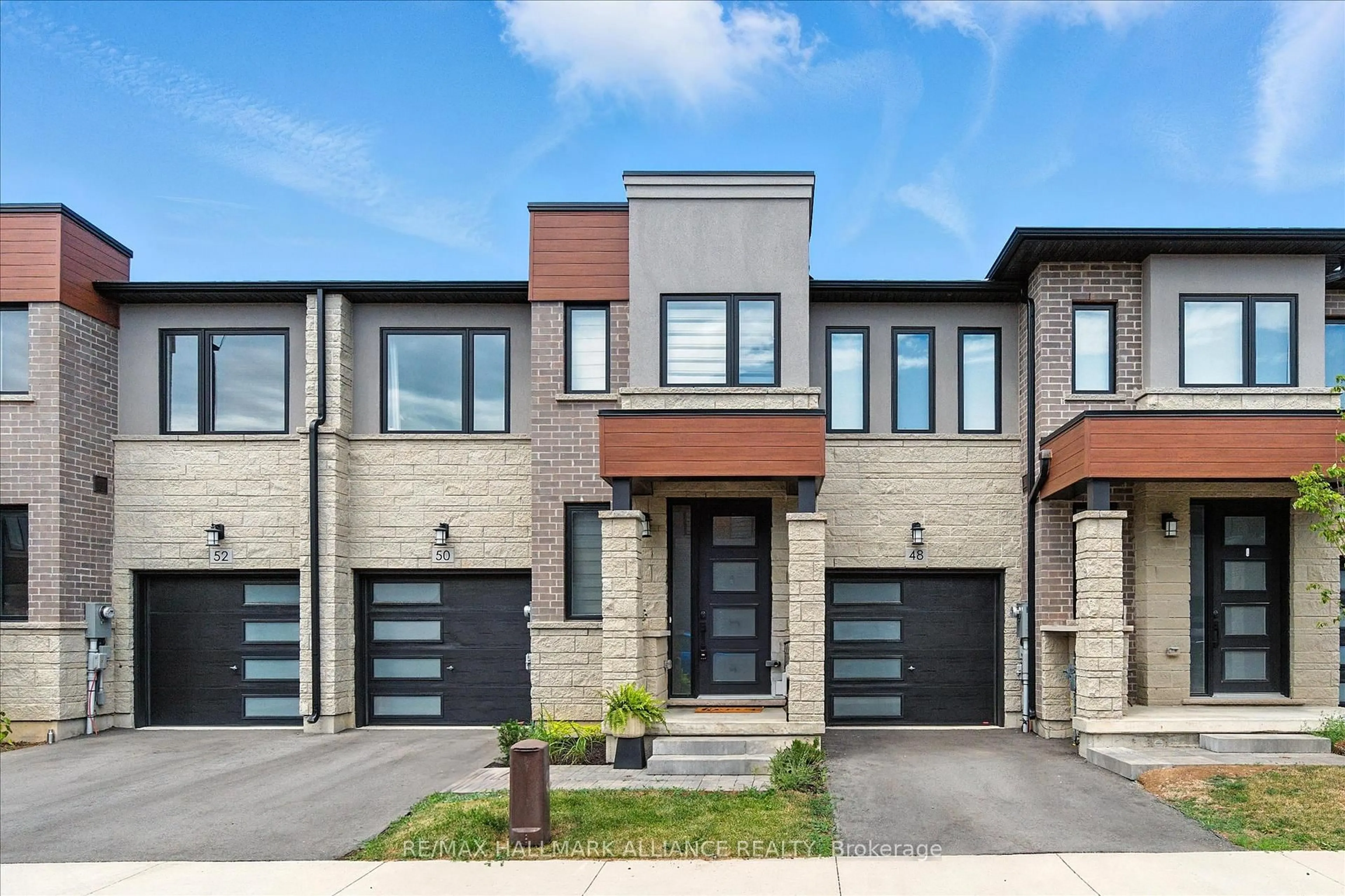 Home with brick exterior material, street for 50 Southam Lane, Hamilton Ontario L9C 0E9