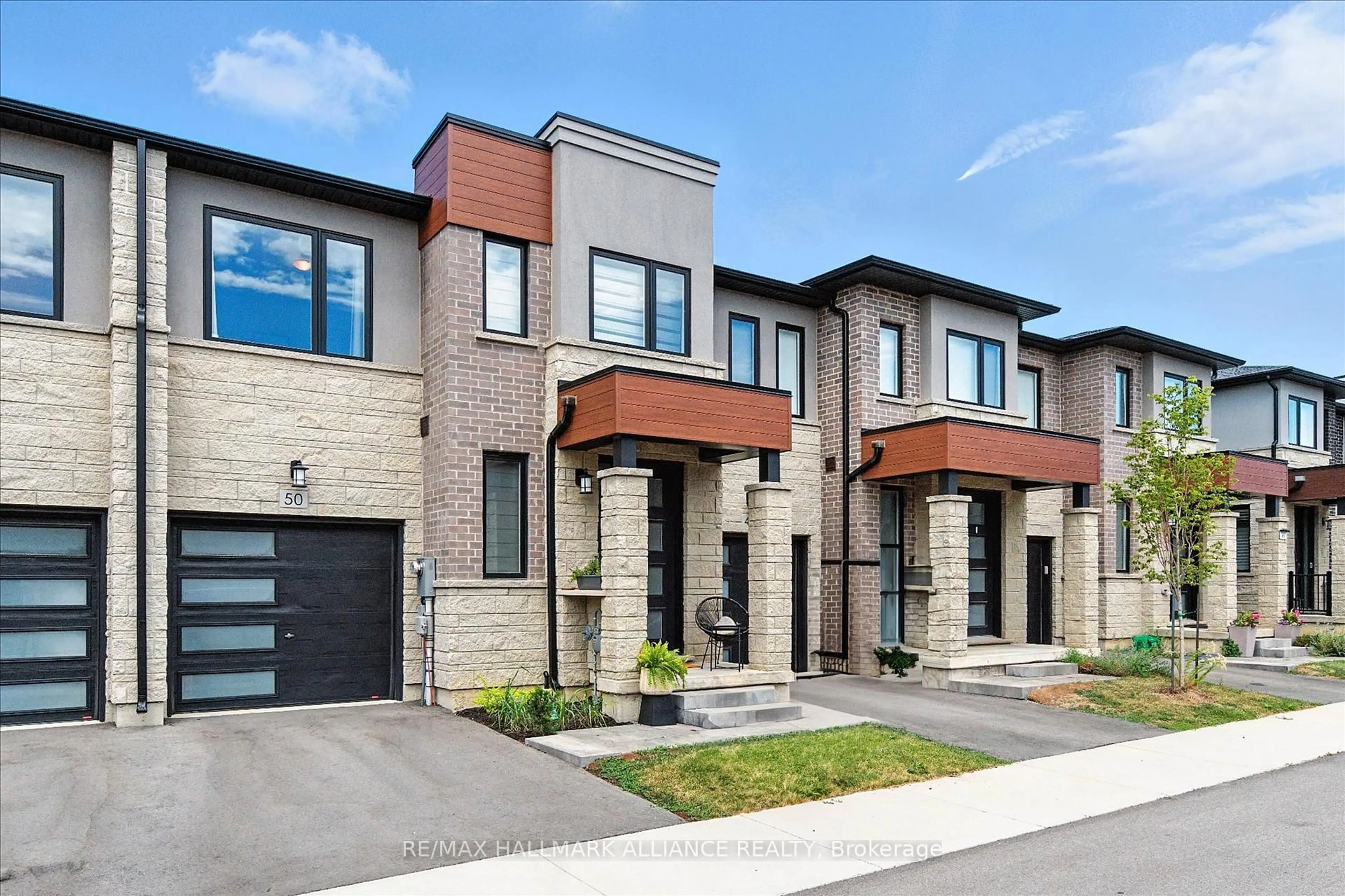 Home with brick exterior material, street for 50 Southam Lane, Hamilton Ontario L9C 0E9