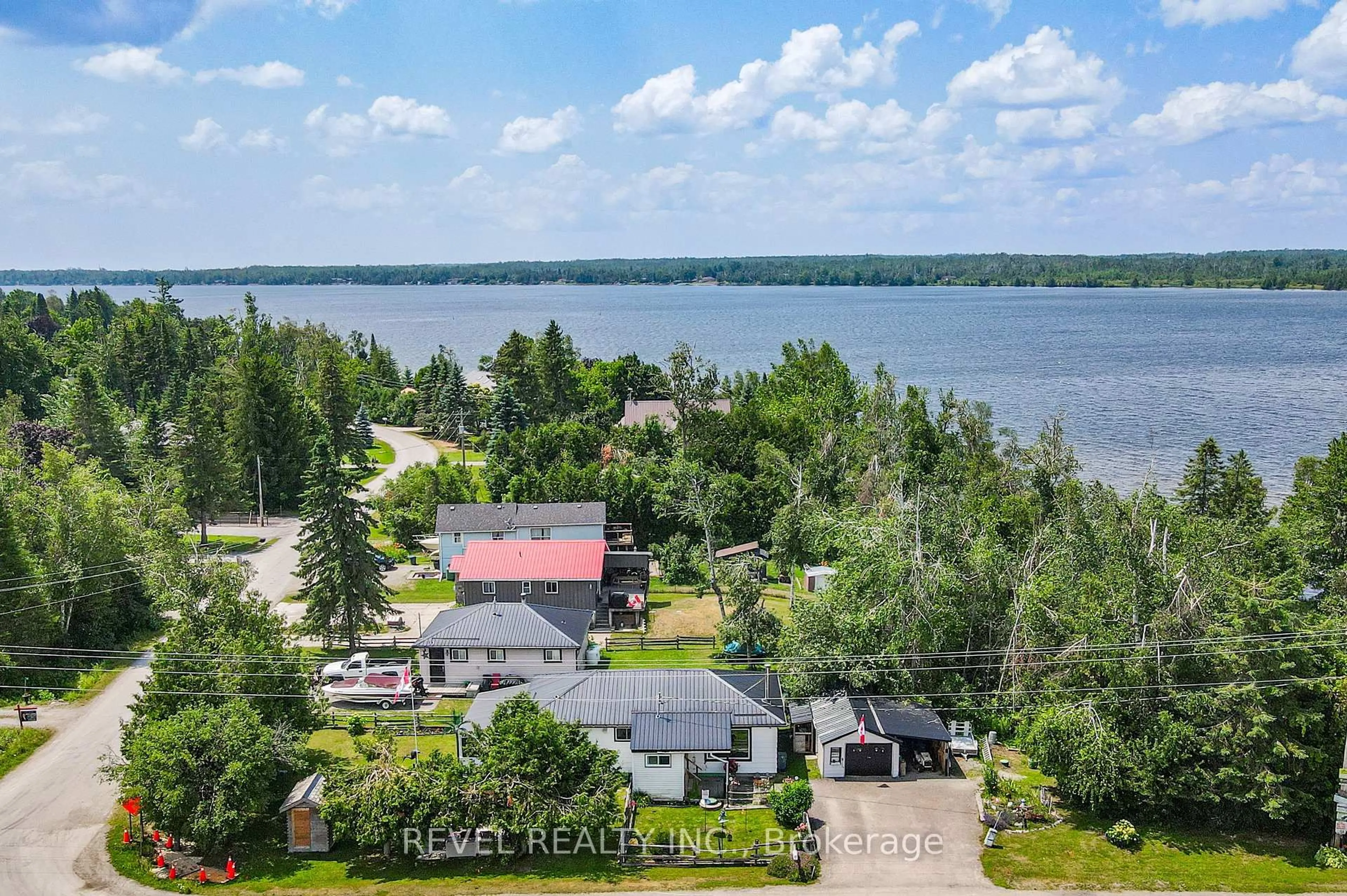 A pic from outside/outdoor area/front of a property/back of a property/a pic from drone, water/lake/river/ocean view for 883 Centennial Park Rd, Kawartha Lakes Ontario K0M 2B0