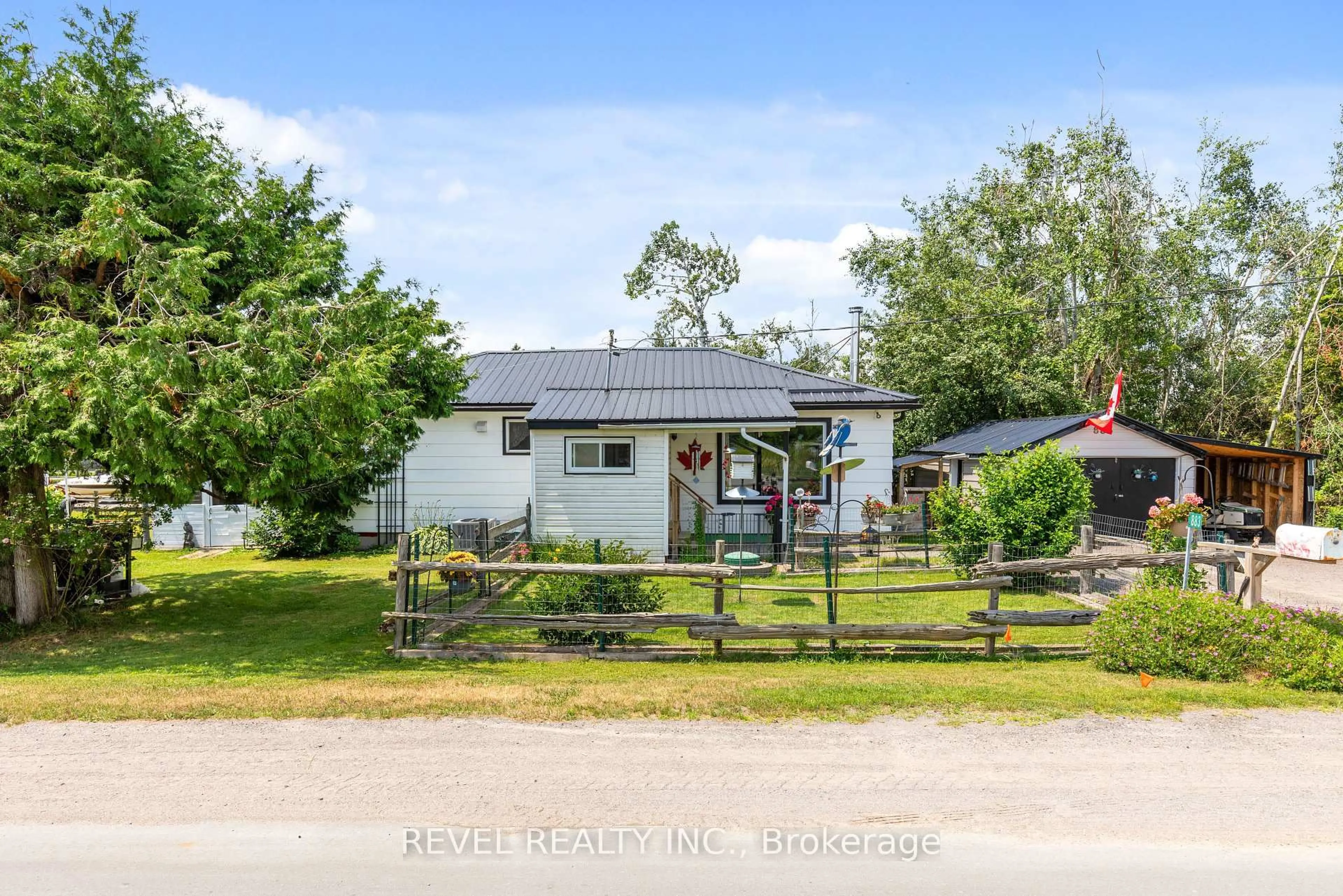 A pic from outside/outdoor area/front of a property/back of a property/a pic from drone, street for 883 Centennial Park Rd, Kawartha Lakes Ontario K0M 2B0