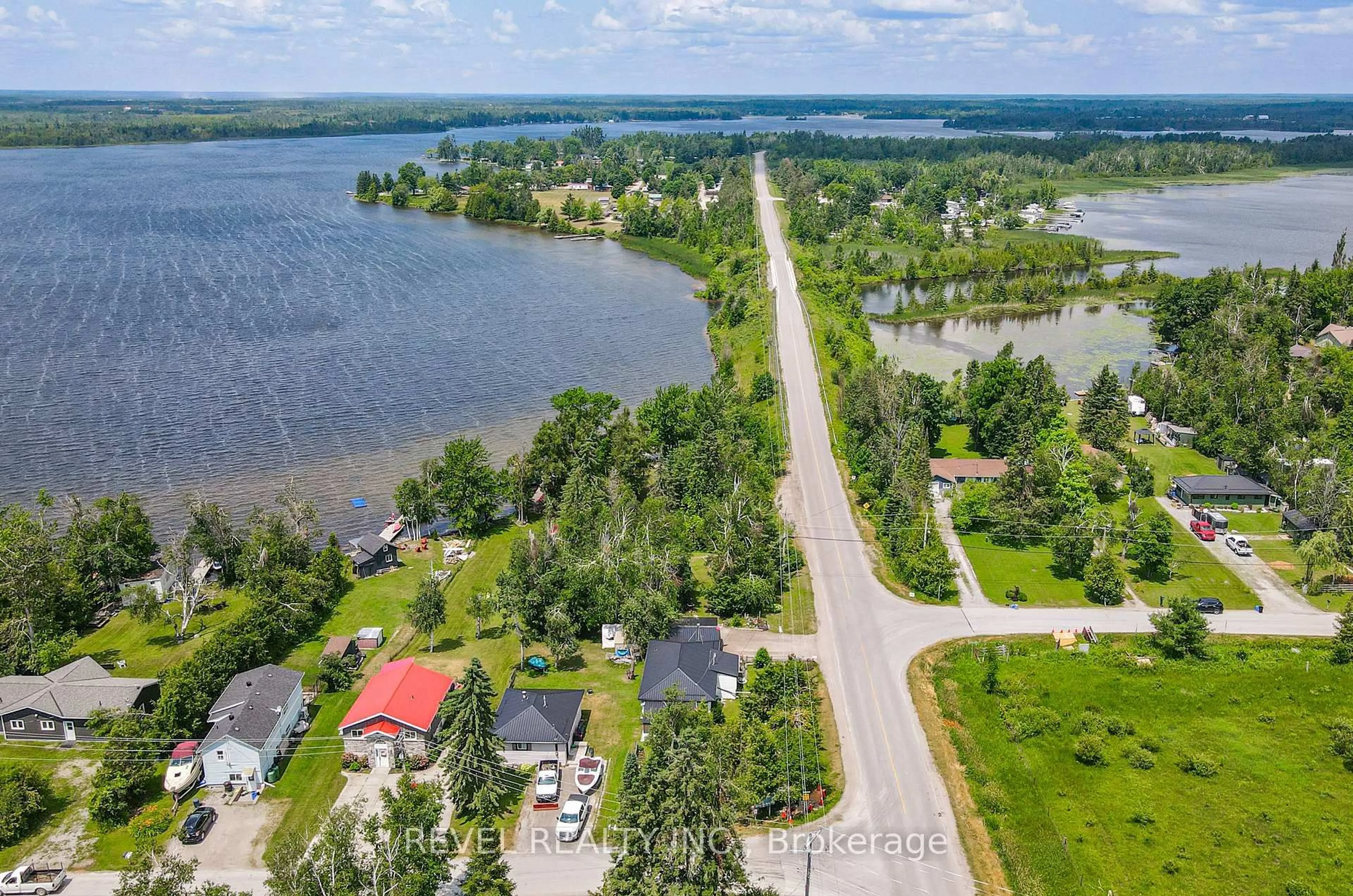 A pic from outside/outdoor area/front of a property/back of a property/a pic from drone, water/lake/river/ocean view for 883 Centennial Park Rd, Kawartha Lakes Ontario K0M 2B0