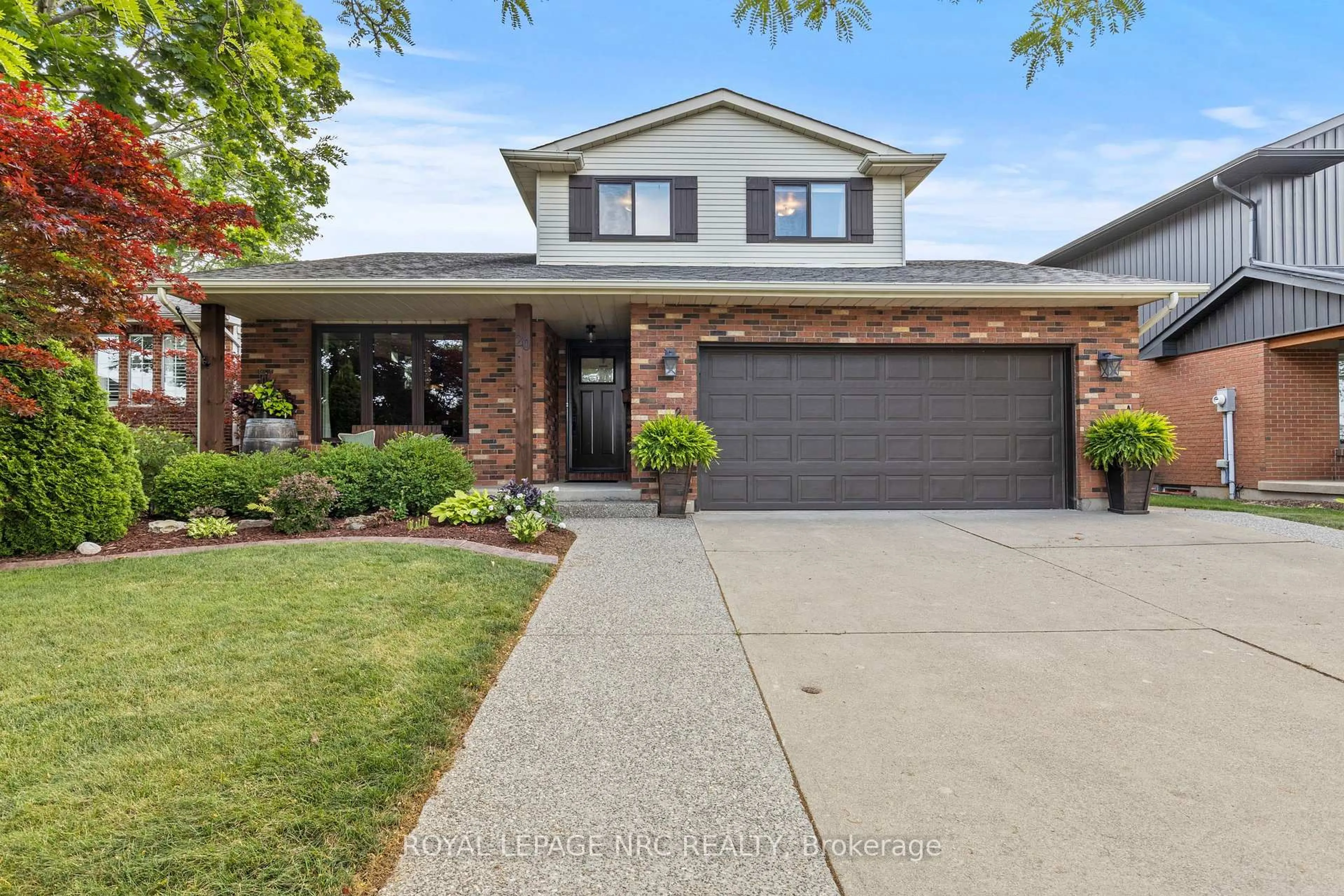 Home with brick exterior material, street for 20 Courtleigh Rd, St. Catharines Ontario L2N 7E8