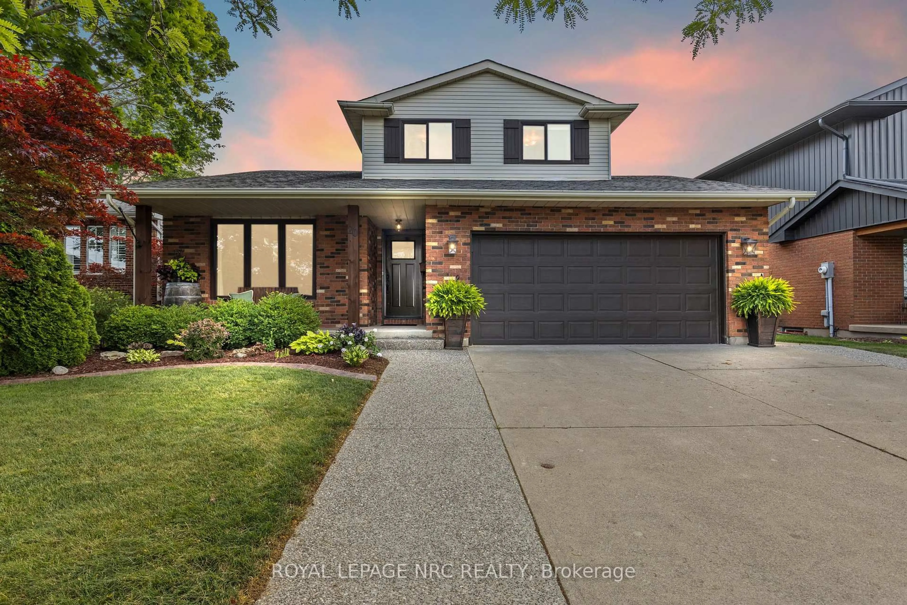 Home with brick exterior material, street for 20 Courtleigh Rd, St. Catharines Ontario L2N 7E8