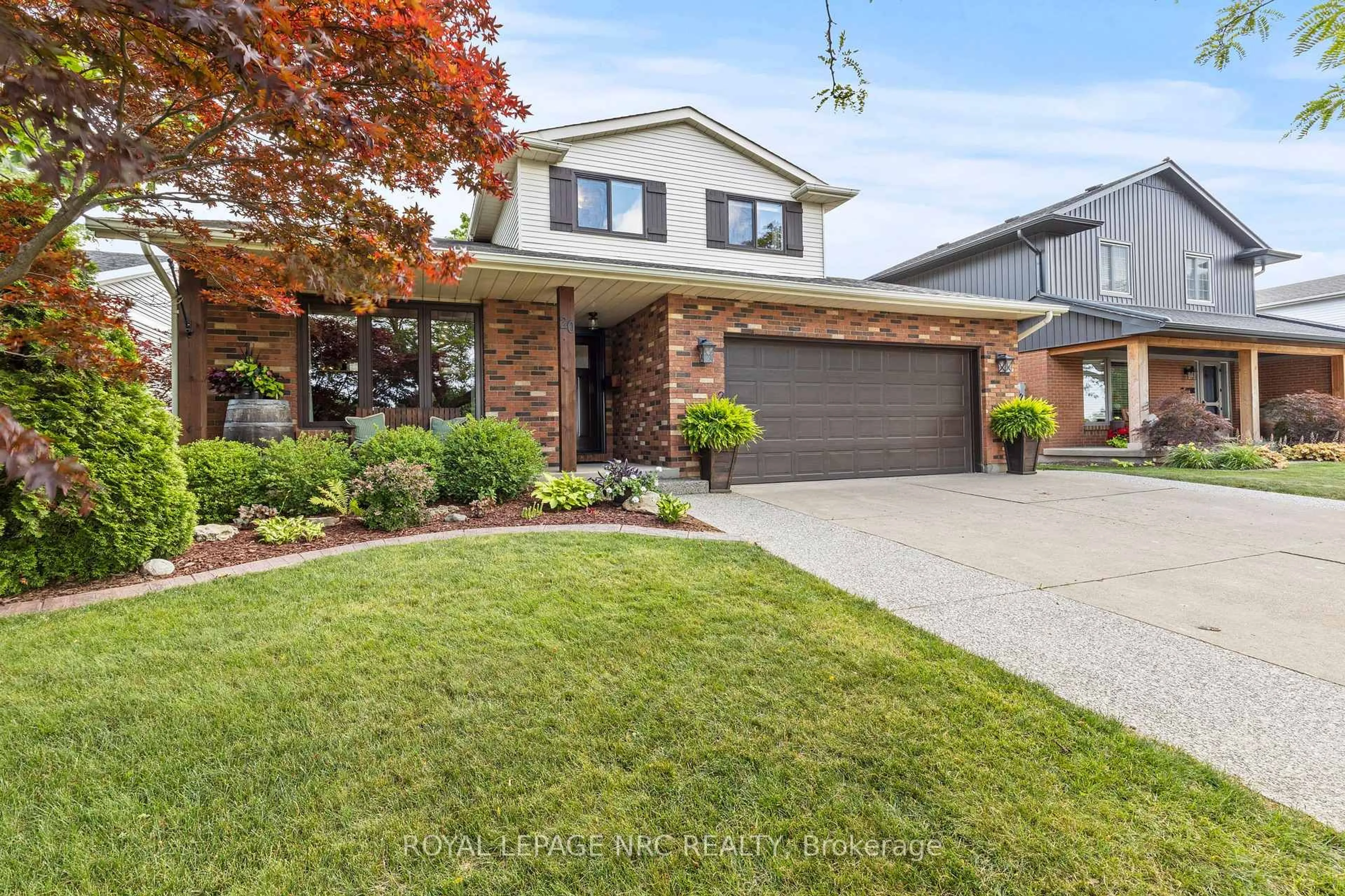 Home with brick exterior material, street for 20 Courtleigh Rd, St. Catharines Ontario L2N 7E8