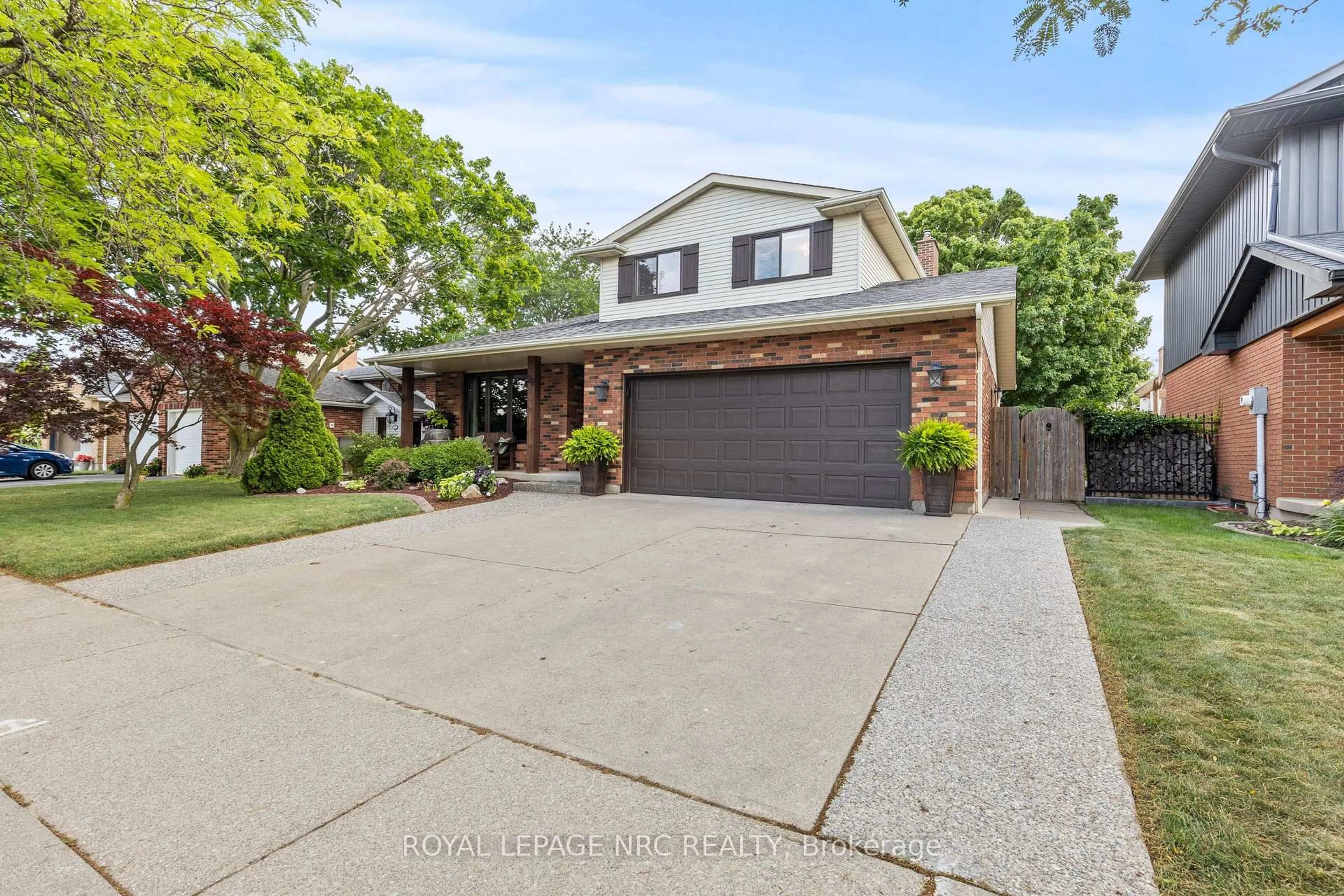 Home with brick exterior material, street for 20 Courtleigh Rd, St. Catharines Ontario L2N 7E8