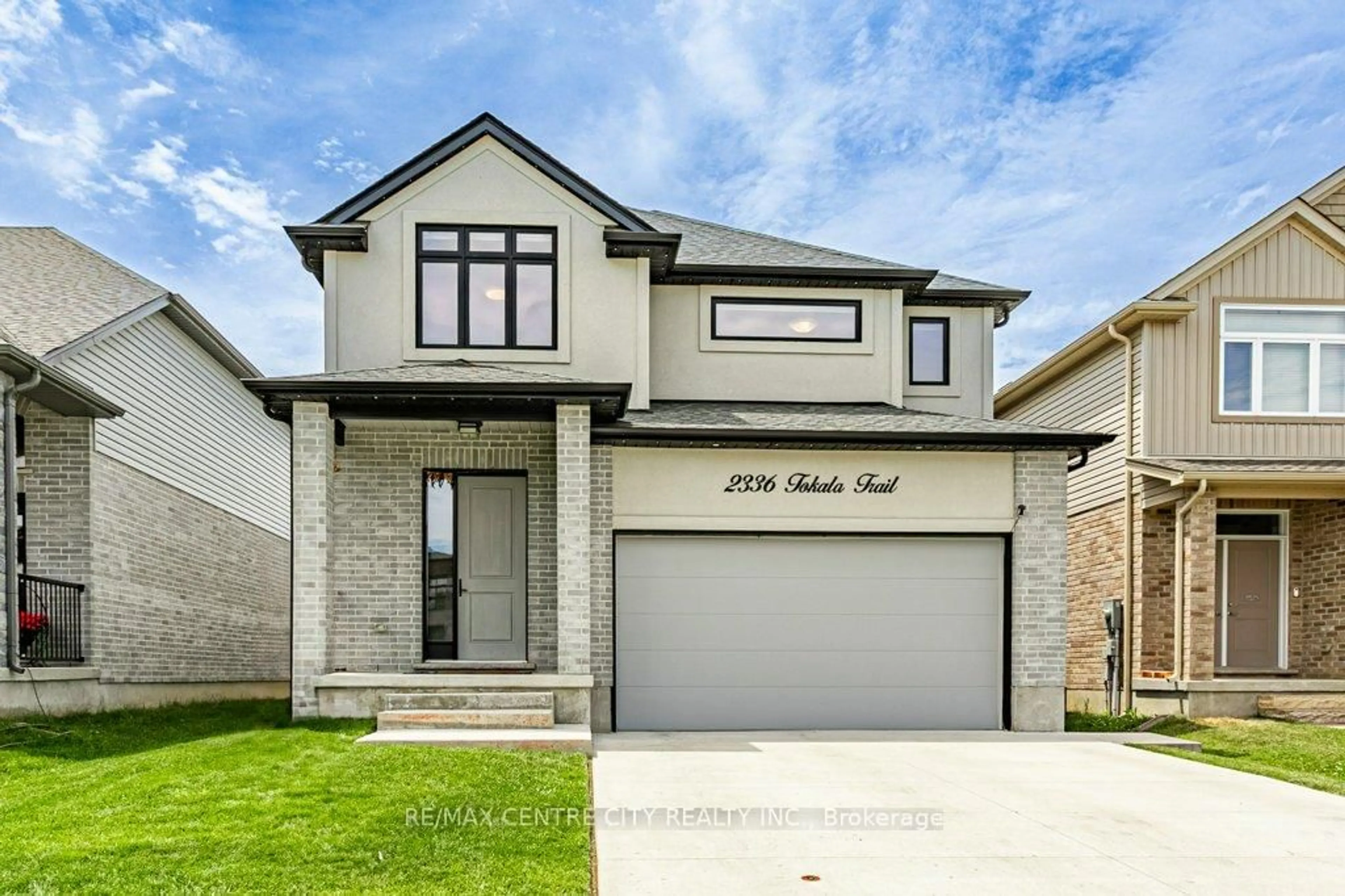 Home with brick exterior material, street for 2336 Tokala Tr, London North Ontario N6G 0V6