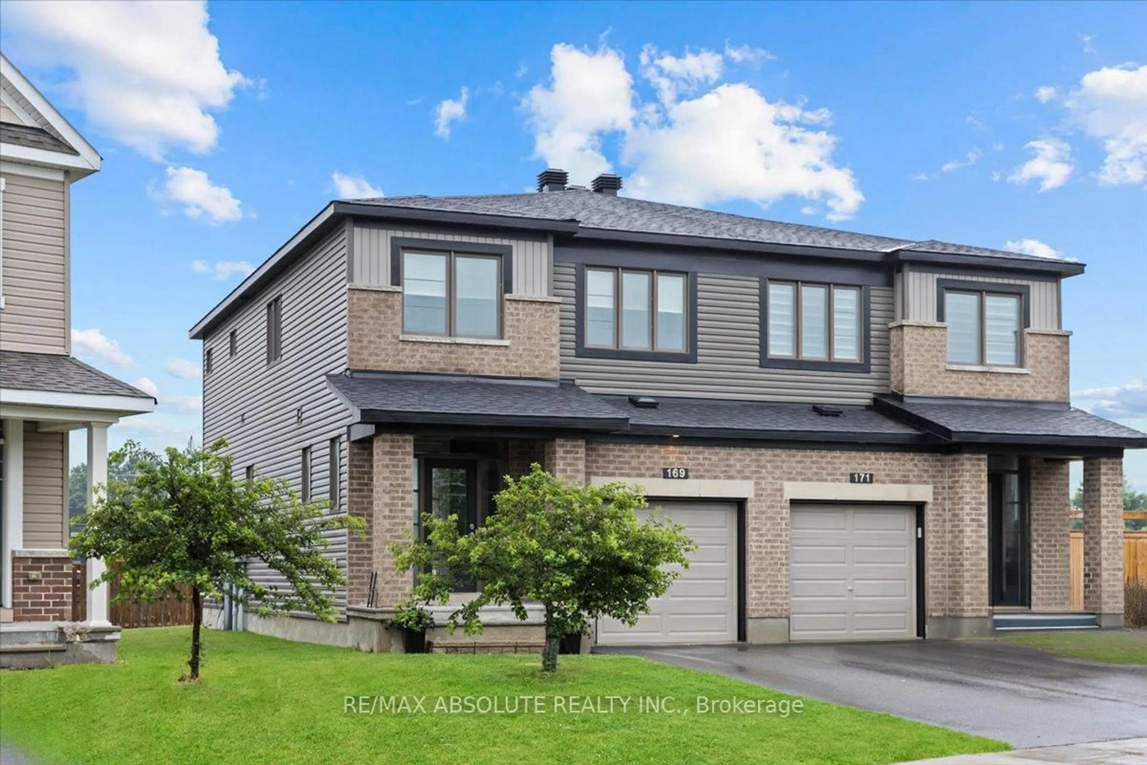 Home with brick exterior material, street for 169 Bandelier Way, Ottawa Ontario K2S 2J5